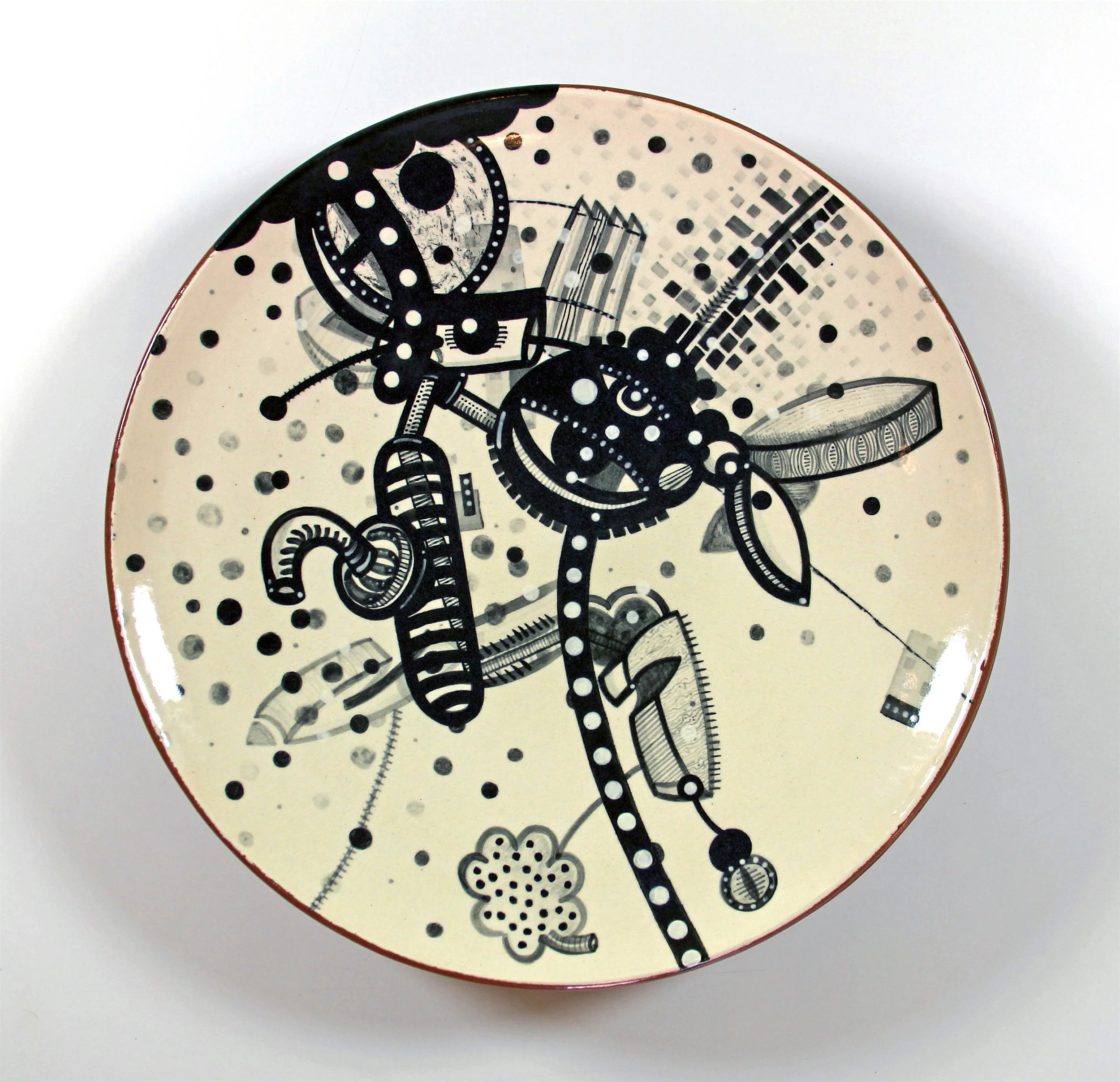 J. Knight/ C. Skura 2011. Earthenware, hand-painted underglaze and clear glaze. 17" in diameter x 4" H..