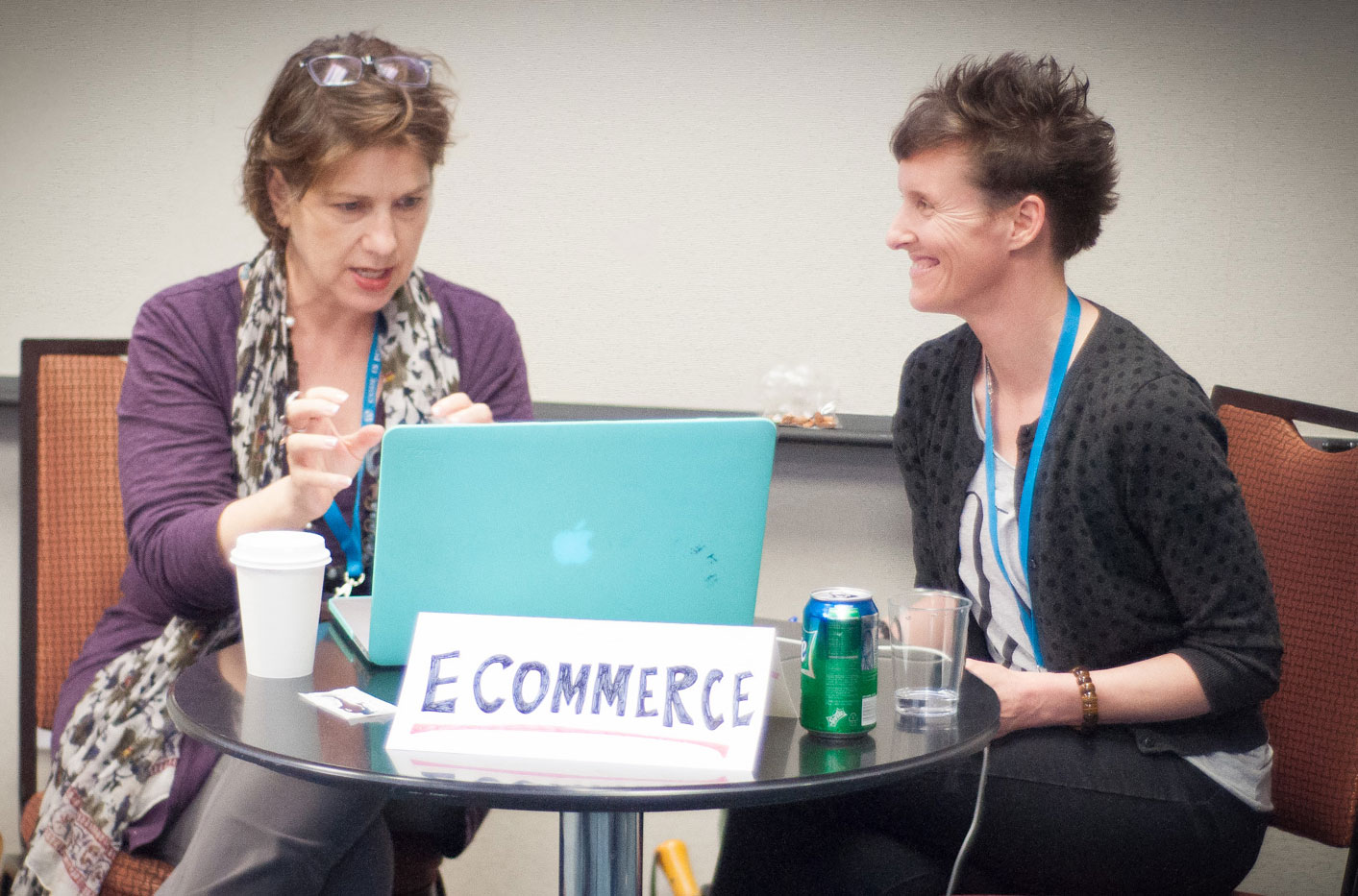 Melissa testing the Command C website with a small business shop owner at WordCamp Atlanta.