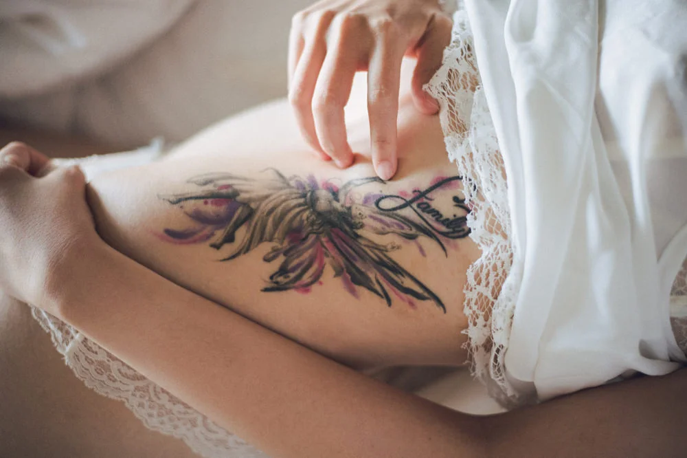 boudoir photo with tattoo on body