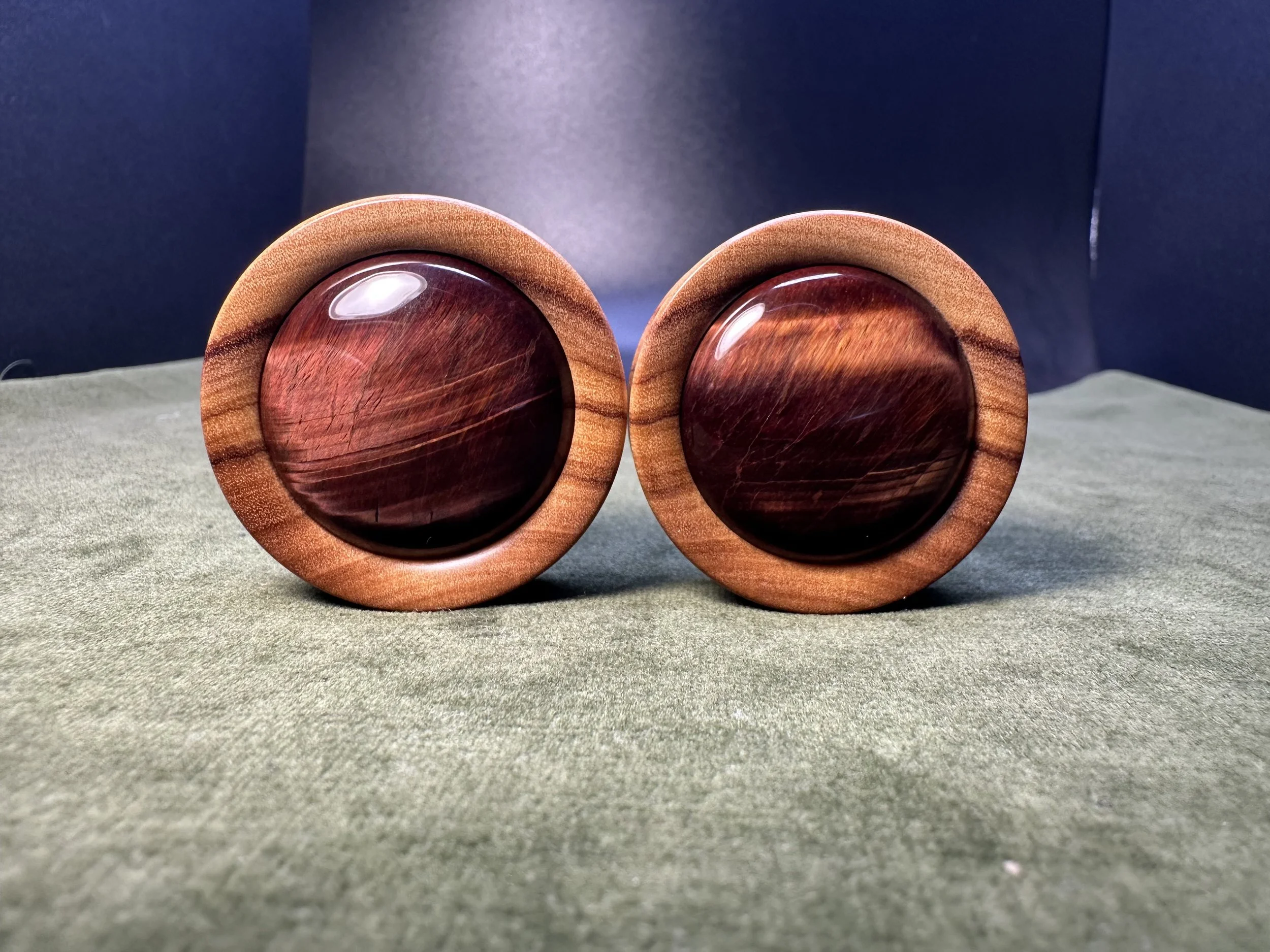 1 1/2” wild olivewood with red tiger eye