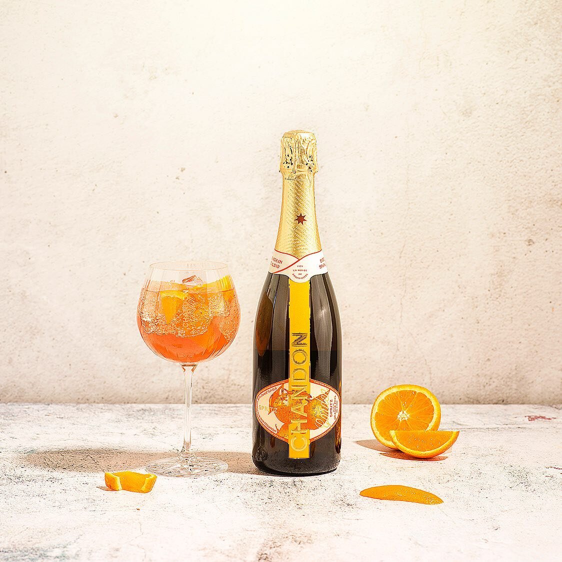 Looking forward to some spring weather at the end of this week . 
This drink is perfect for sunny weather. 

#chandongardenspritz #drinks #champagne #liquidphotography #oranges #productphotography #drinksphotography