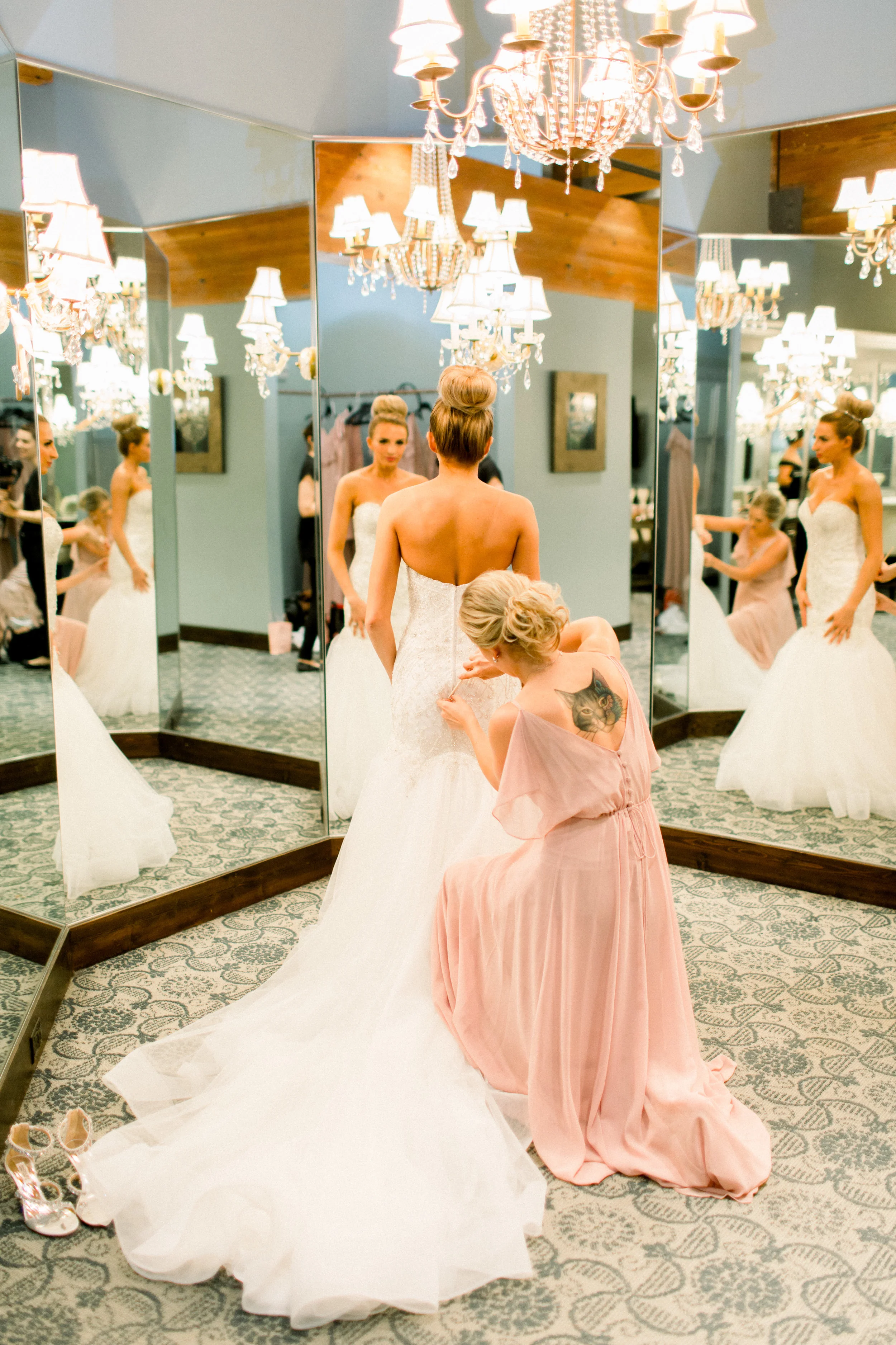 Bride Putting on Dress.jpg