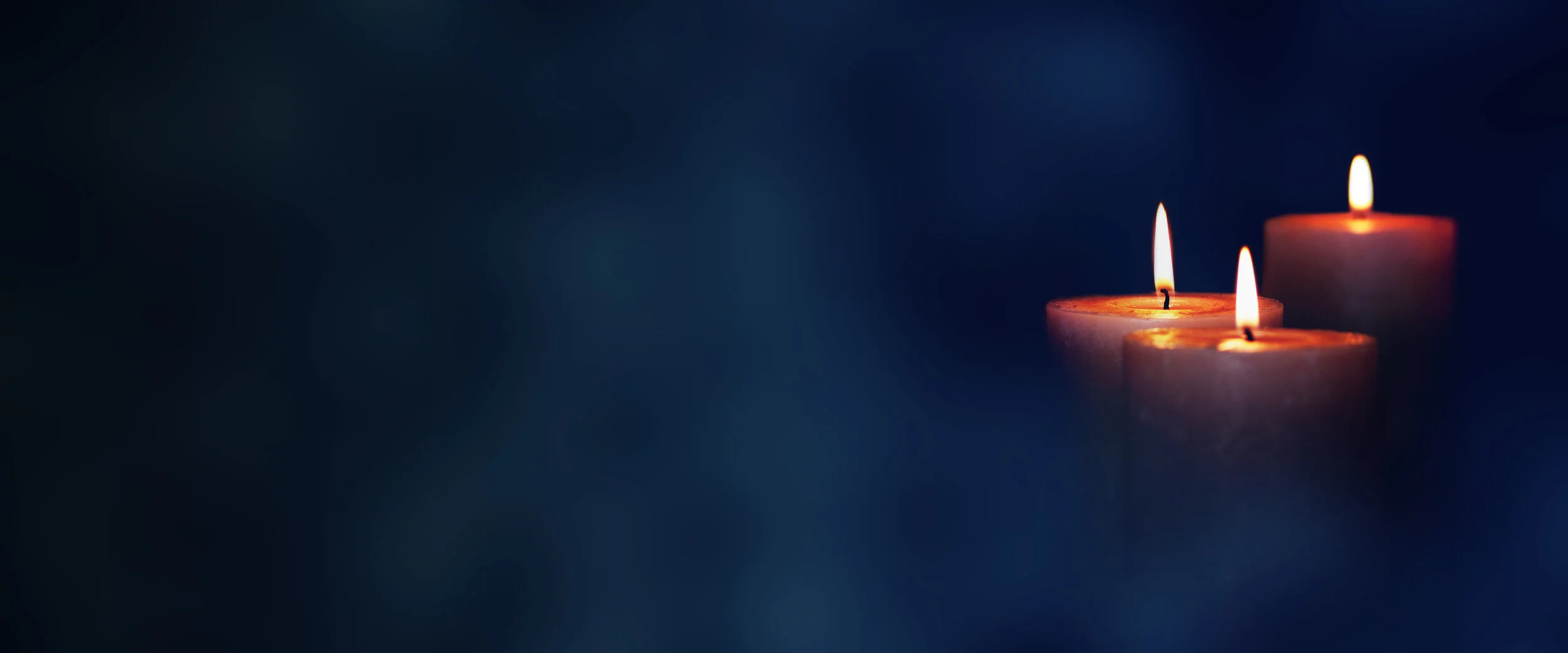 PRAYER CANDLES AdobeStock_165212949.jpeg