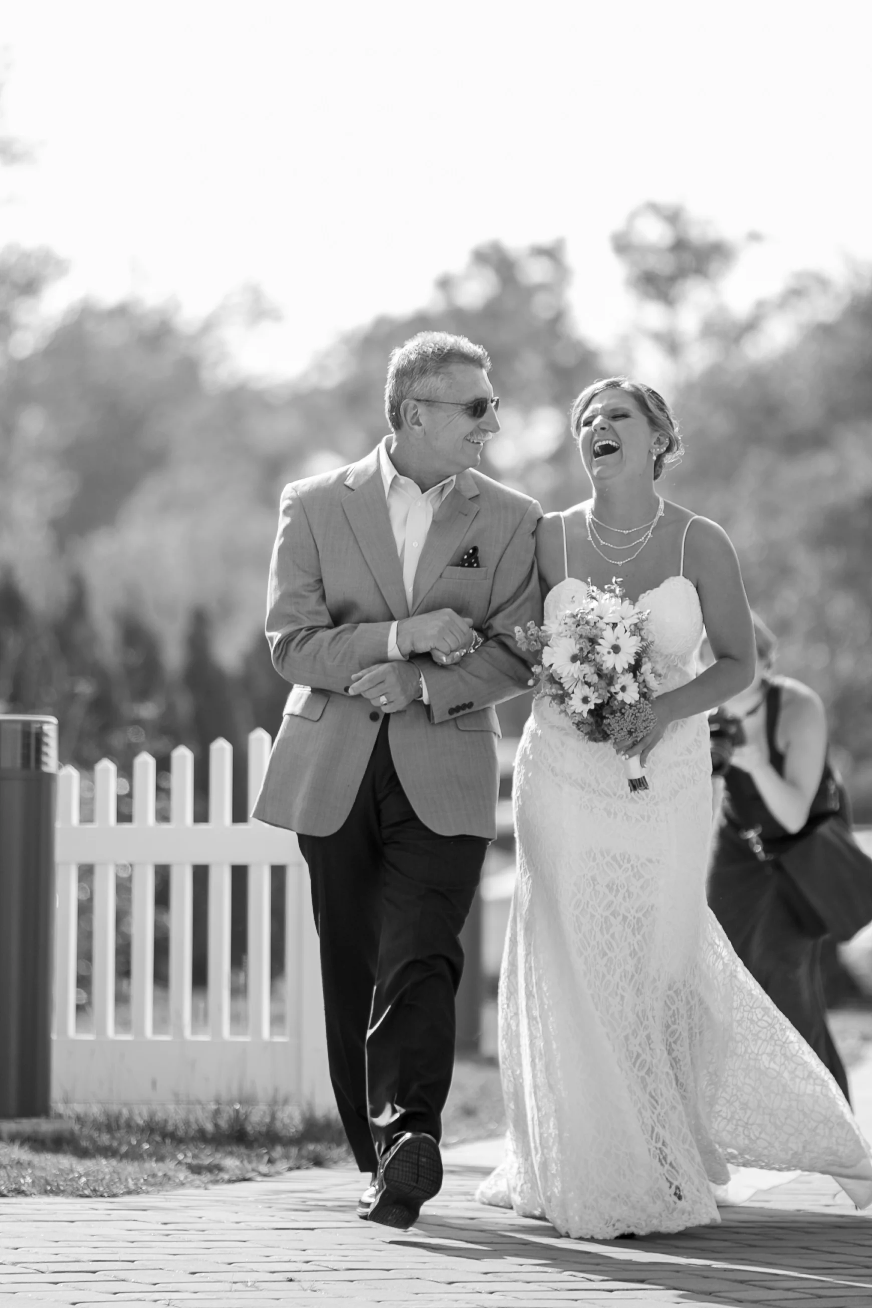 Father walking bride down aisle