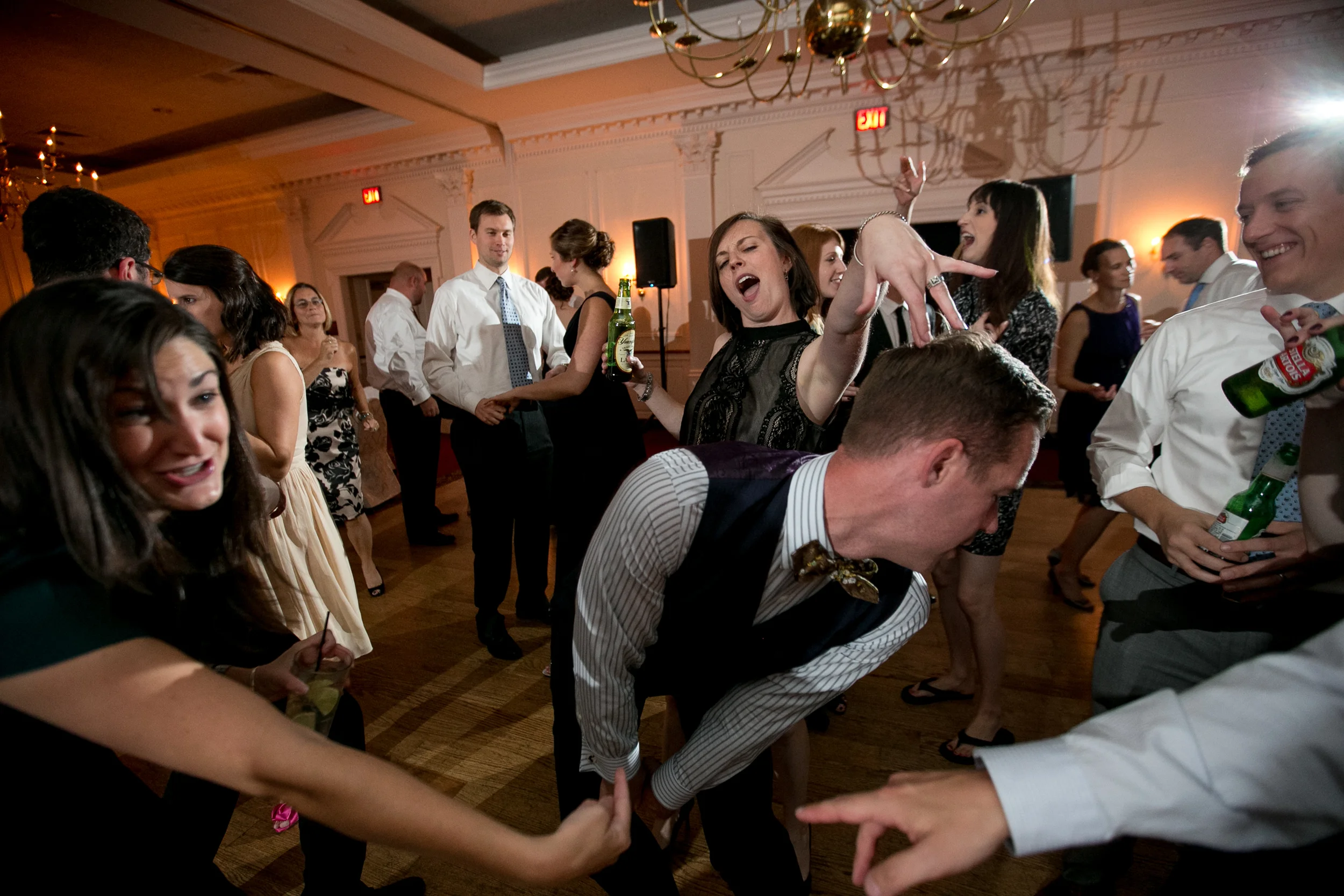 Wedding guests dancing at reception