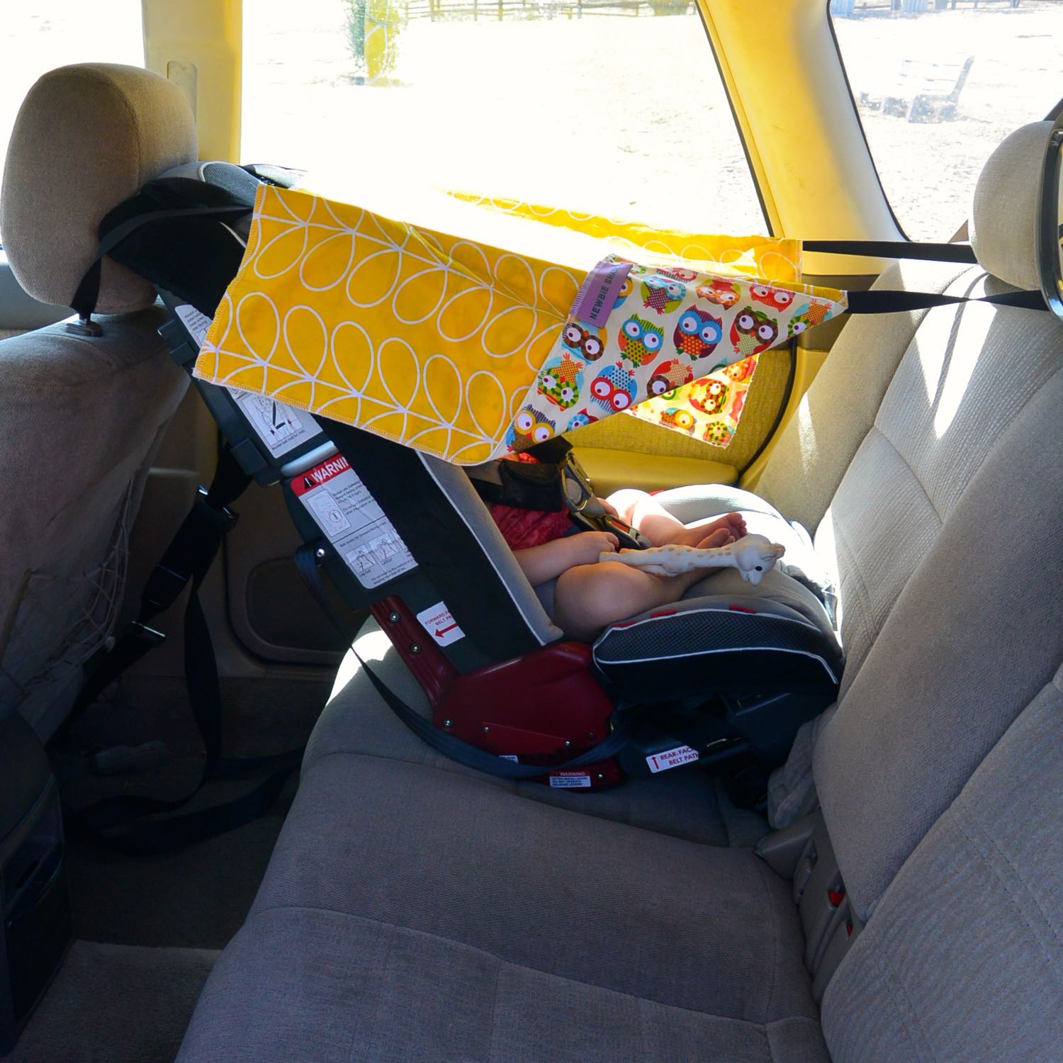 Step 8: Secure your baby in their car seat and enjoy Newbie Shade