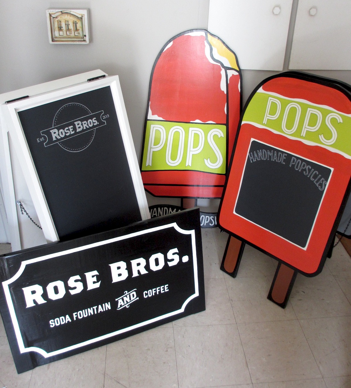 COMPLETELY HAND-BUILT & PAINTED SIGNS AND A-FRAMES FOR TWO SISTER RESTAURANTS IN FLORIDA