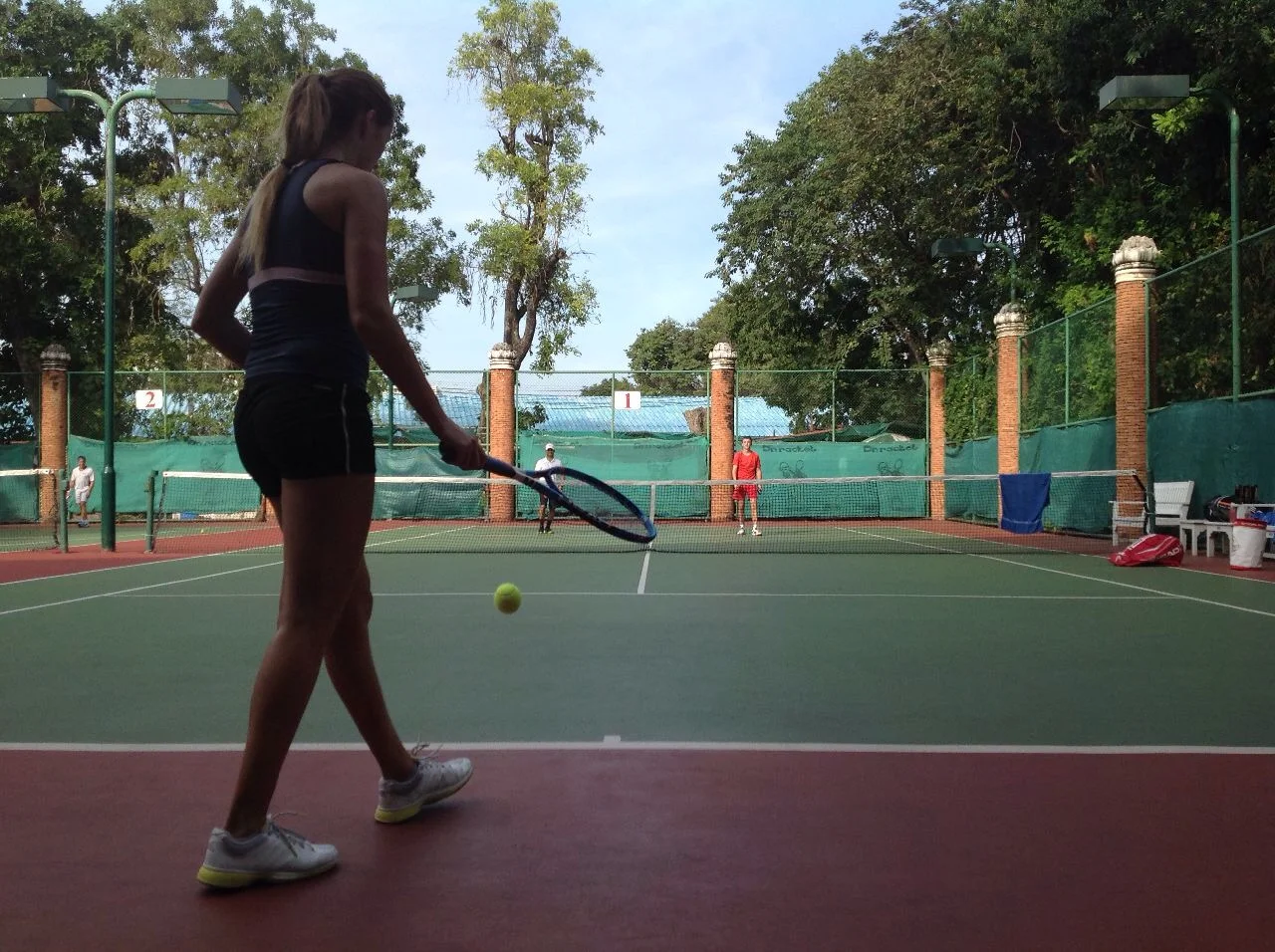 Girl serving from behind.JPG