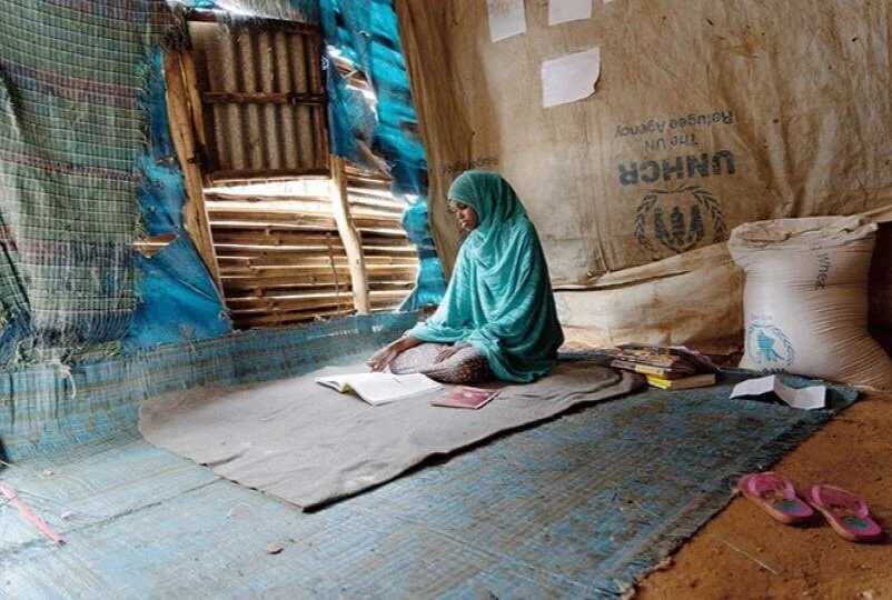 Bilan doing homework to become a doctor.