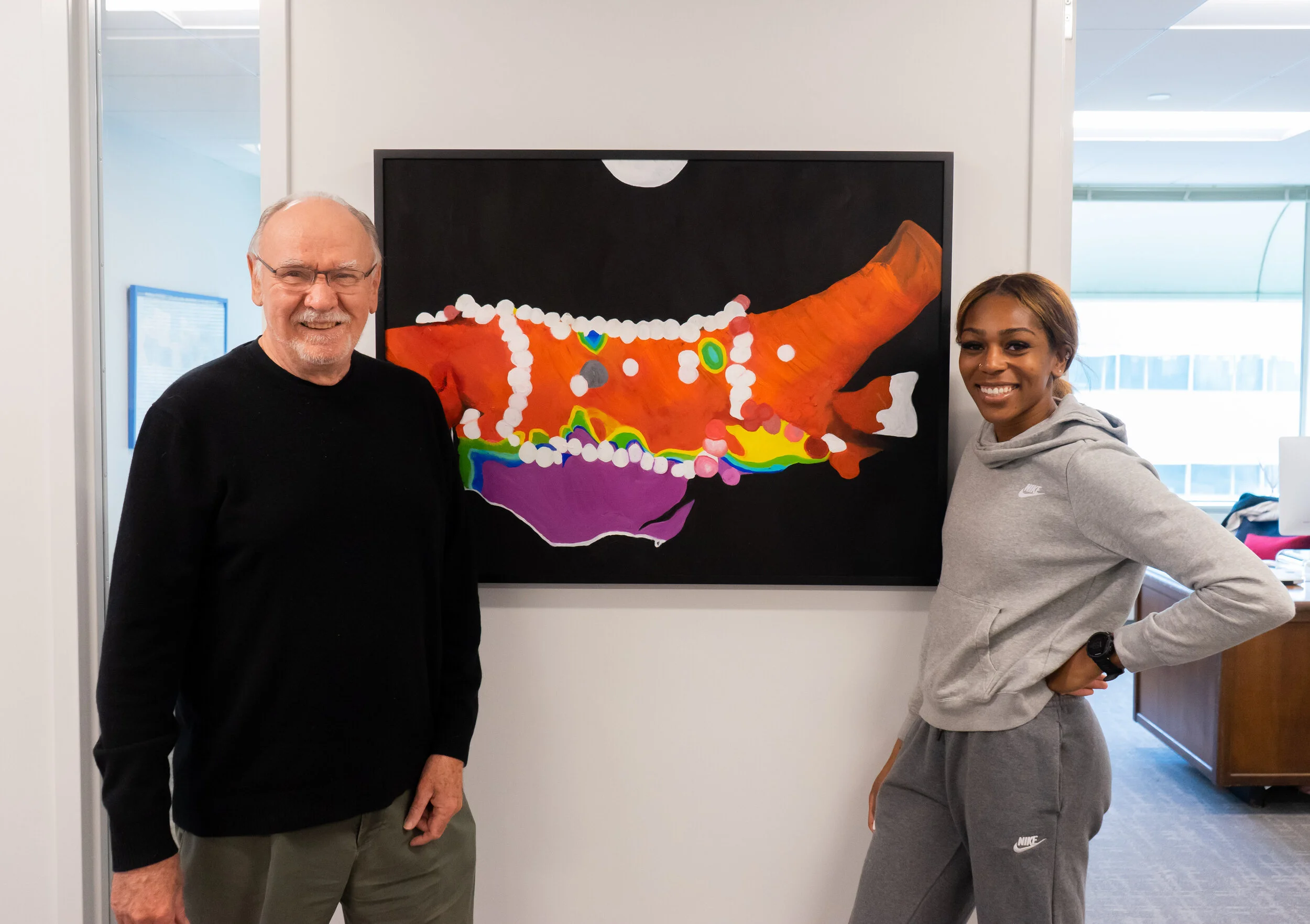  James Johnston, PhD, Founder of Sage Scholars, and Artist/Olympic runner Raevyn Rodgers 