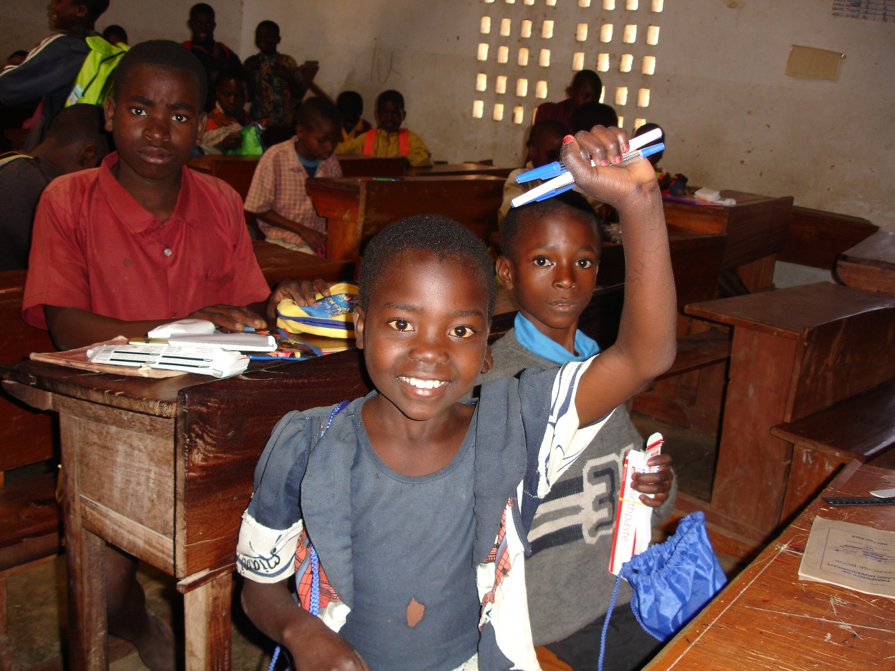 Malawian schoolgirl with donated backpack.jpg