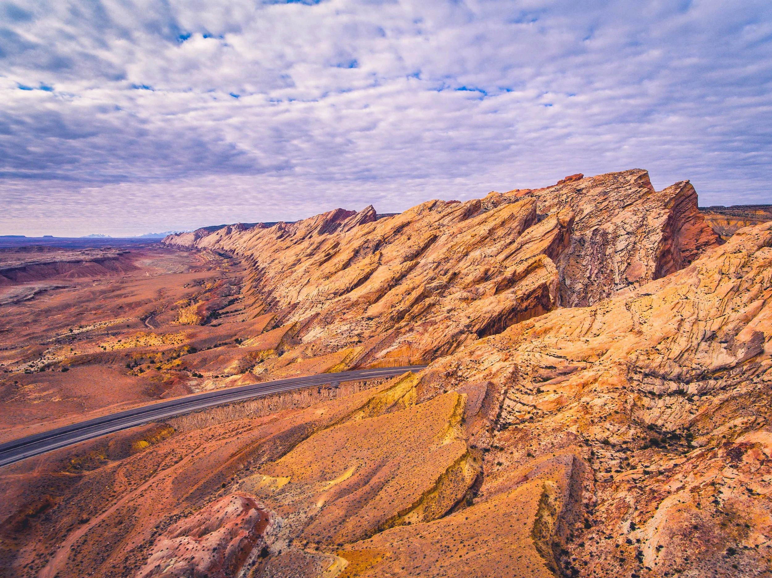 You can't fly a drone in National Parks but there is plenty of BLM land in which to fly.