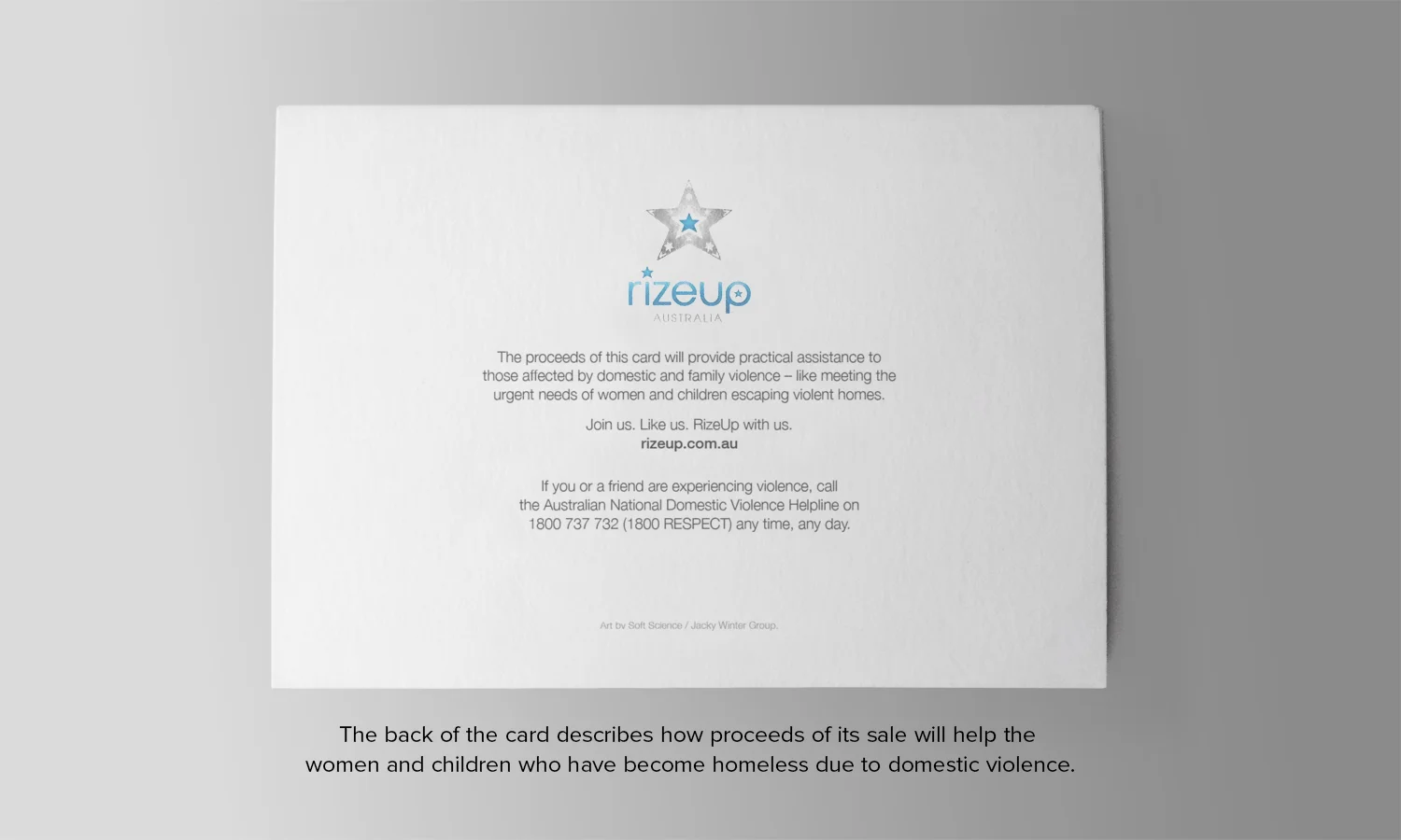 The back of the card describes how proceeds of its sale will help women and children who've become homeless due to domestic violence.