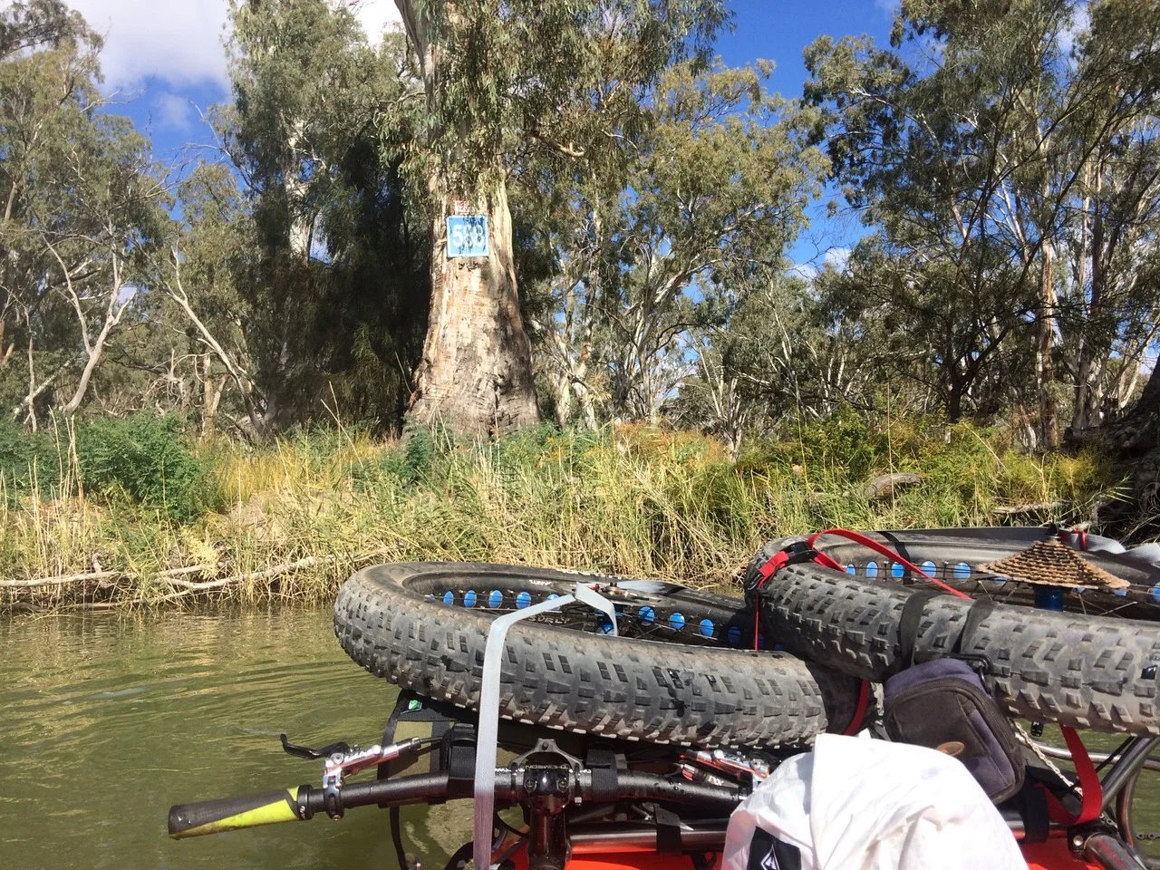 PackRaftAustralia_Alpacka_Raft_Caribou_Bikemounted_packraft_onwater.jpg