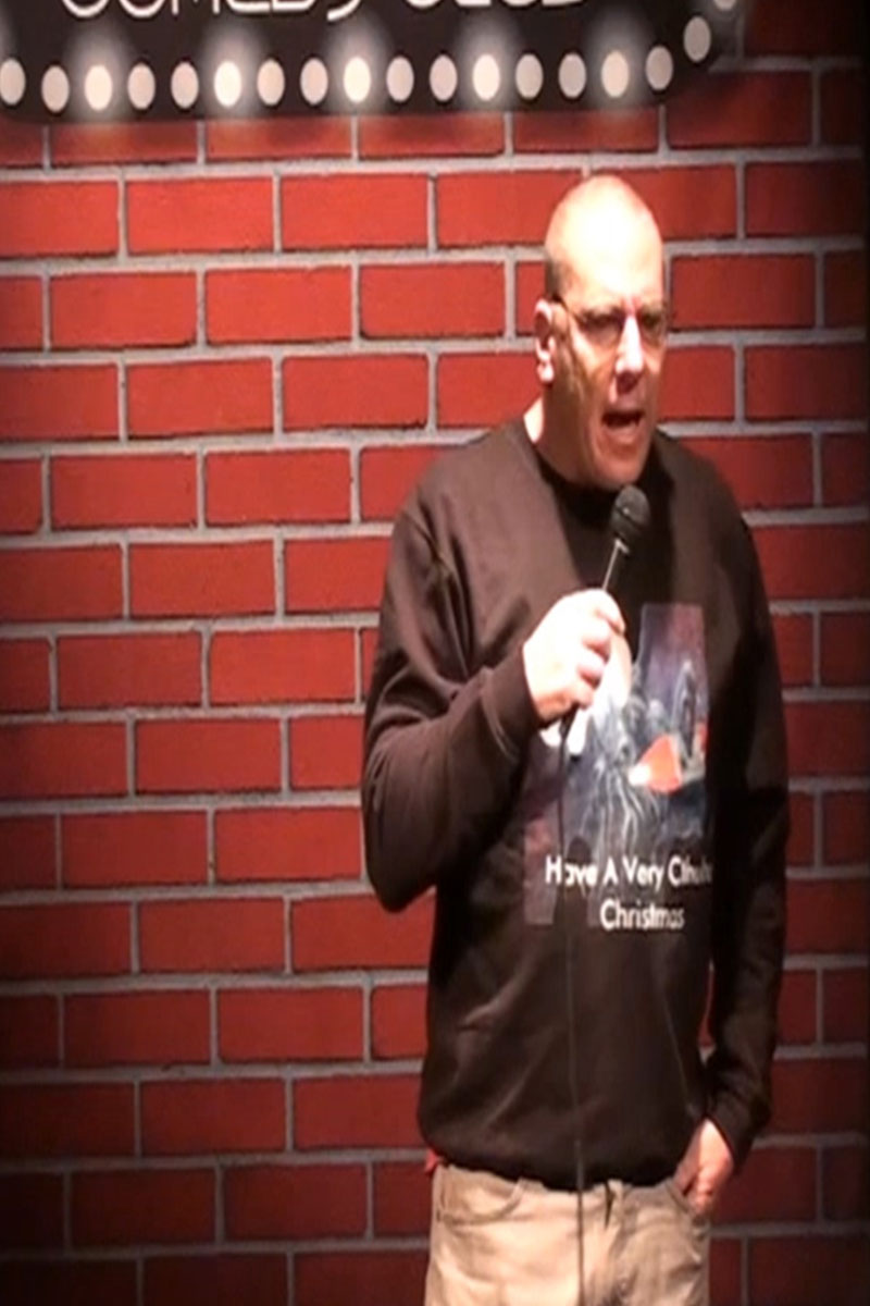 Doug Ecks, Esq. practicing his hobby, Stand Up Comedy at Flappers in Claremont.