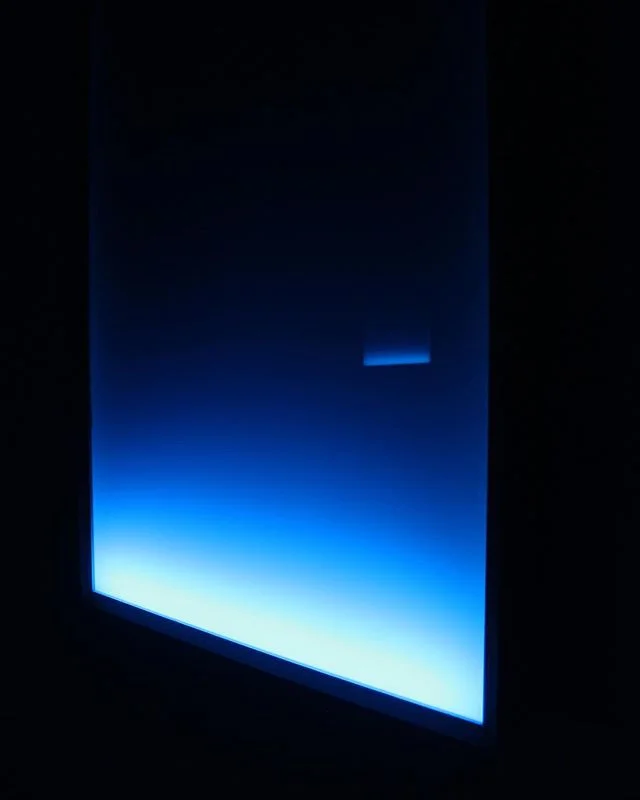 &ldquo;Envelop(e)&rdquo;
Working through appropriation of nature, my attempts to insert external components into interior spaces.  This being dusk inserted into the space of stained glass. Environmental installation. Shown is the reflection from one 