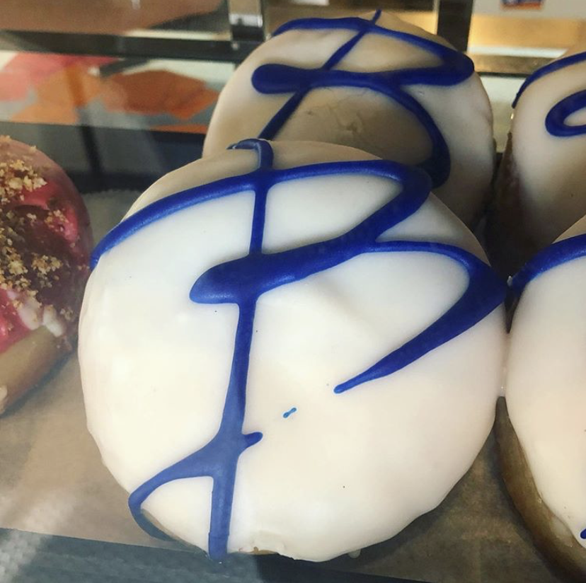 Blueberry Black Pepper - Our vanilla icing filled with blueberry jam with a little kick of cracked black pepper.