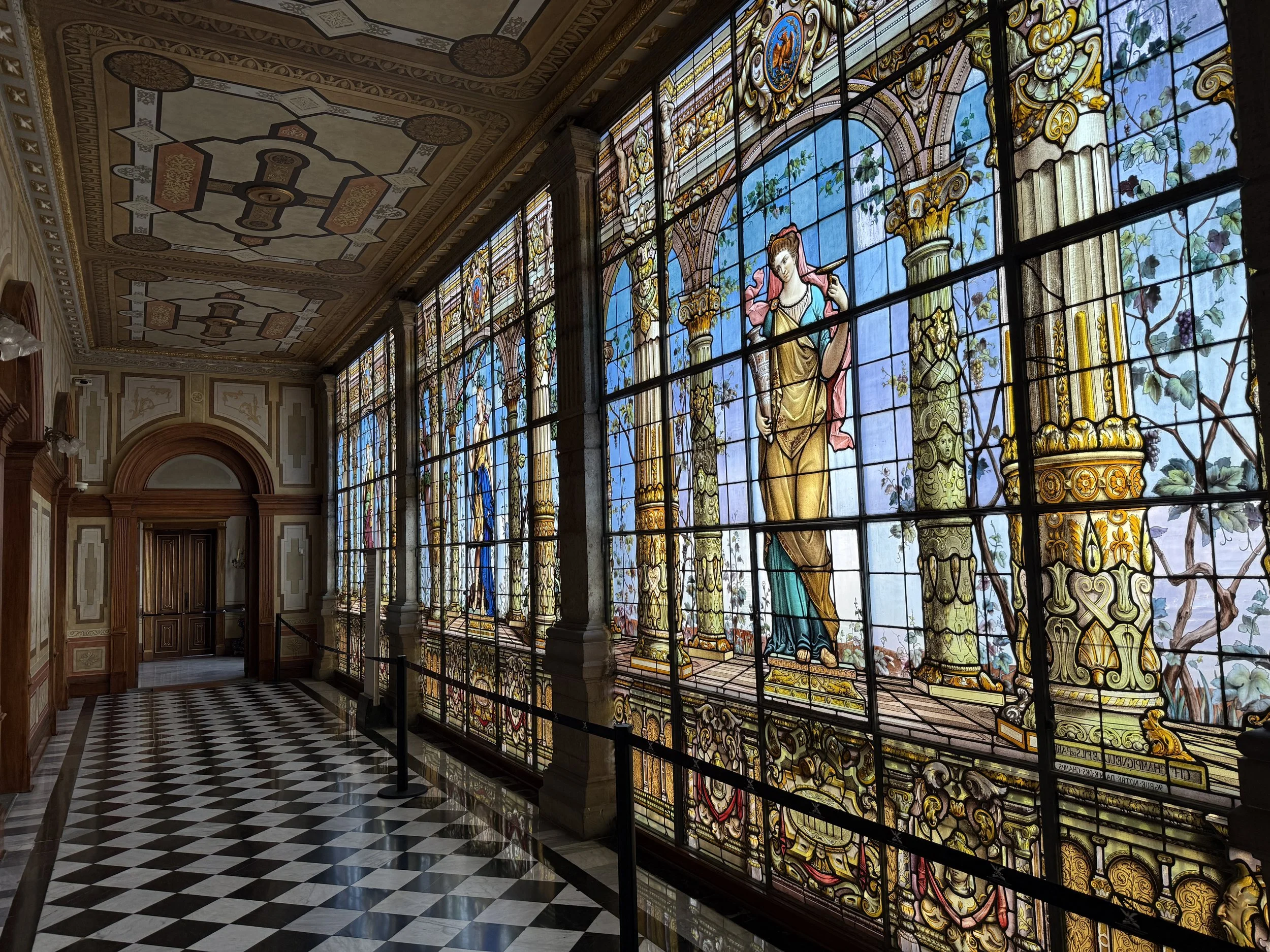 The Galería de Emplomados lined with stained glass windows
