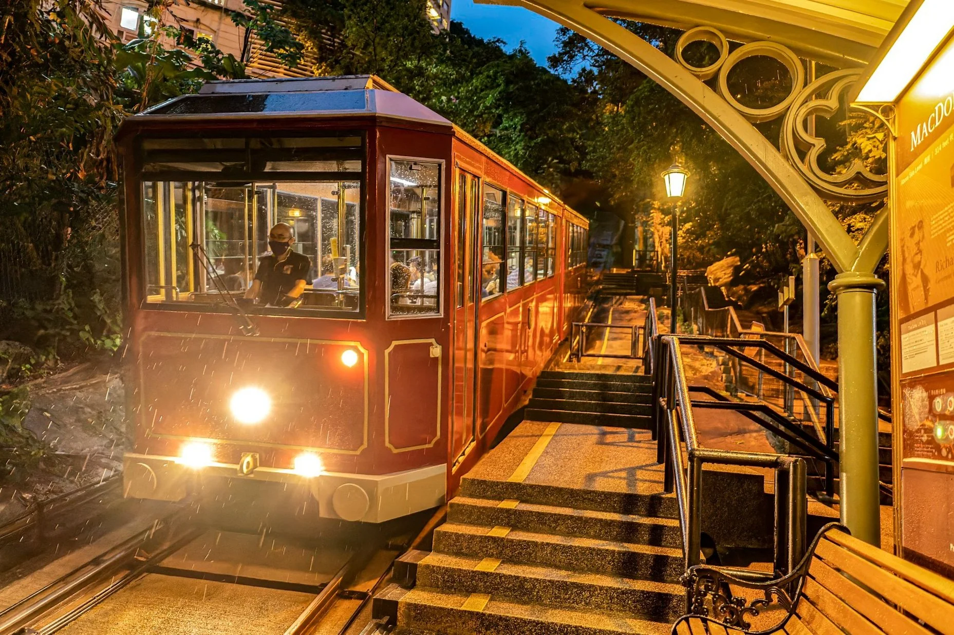 The Peak Tram at a station at night in Hong Kong