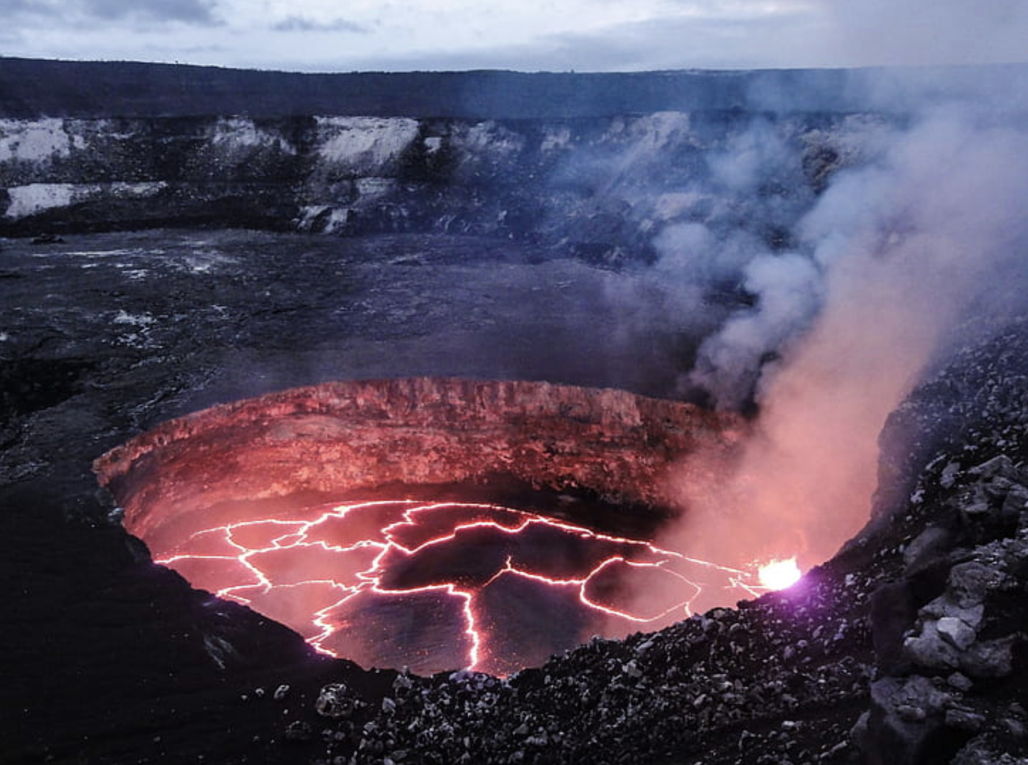 A volcano with lava pool in Hawaii, USA