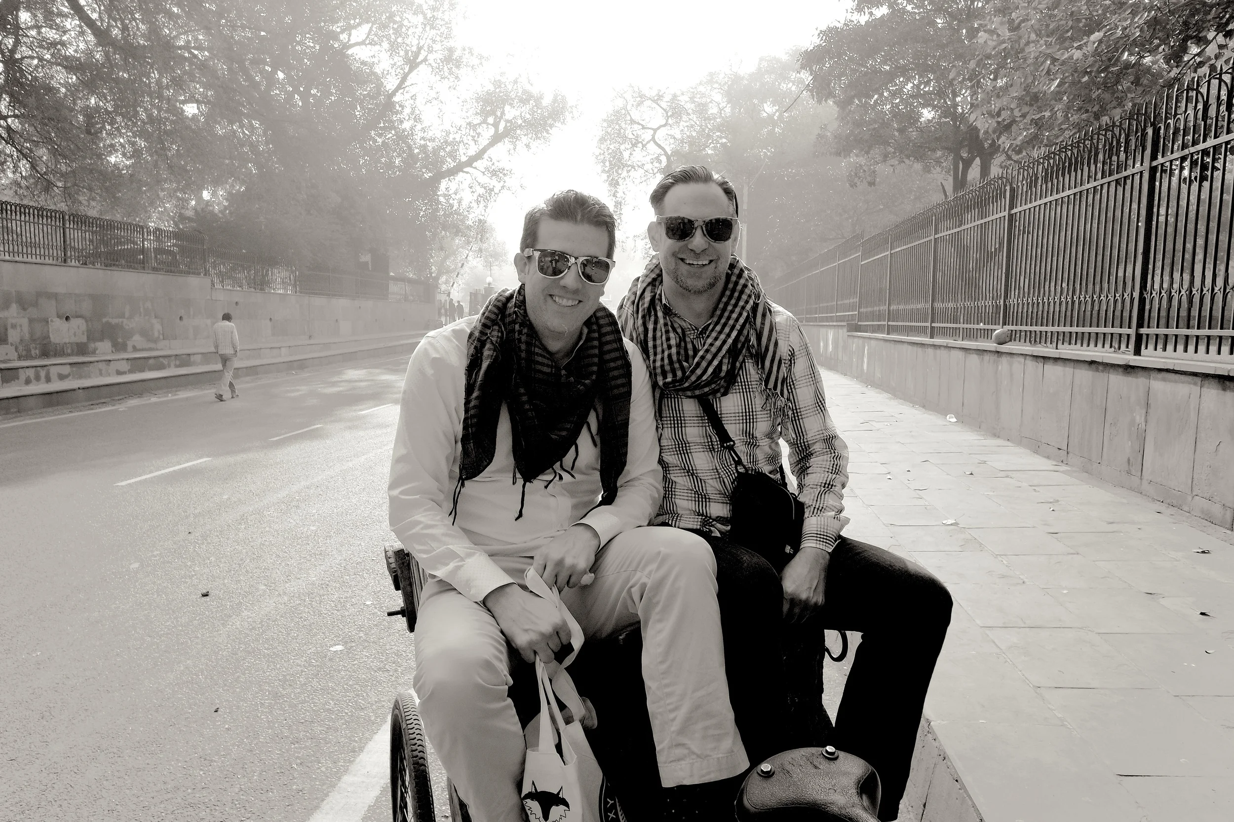 Wally and Duke precariously perched on the back of Mohammed's bicycle rickshaw, ready to explore Old Delhi