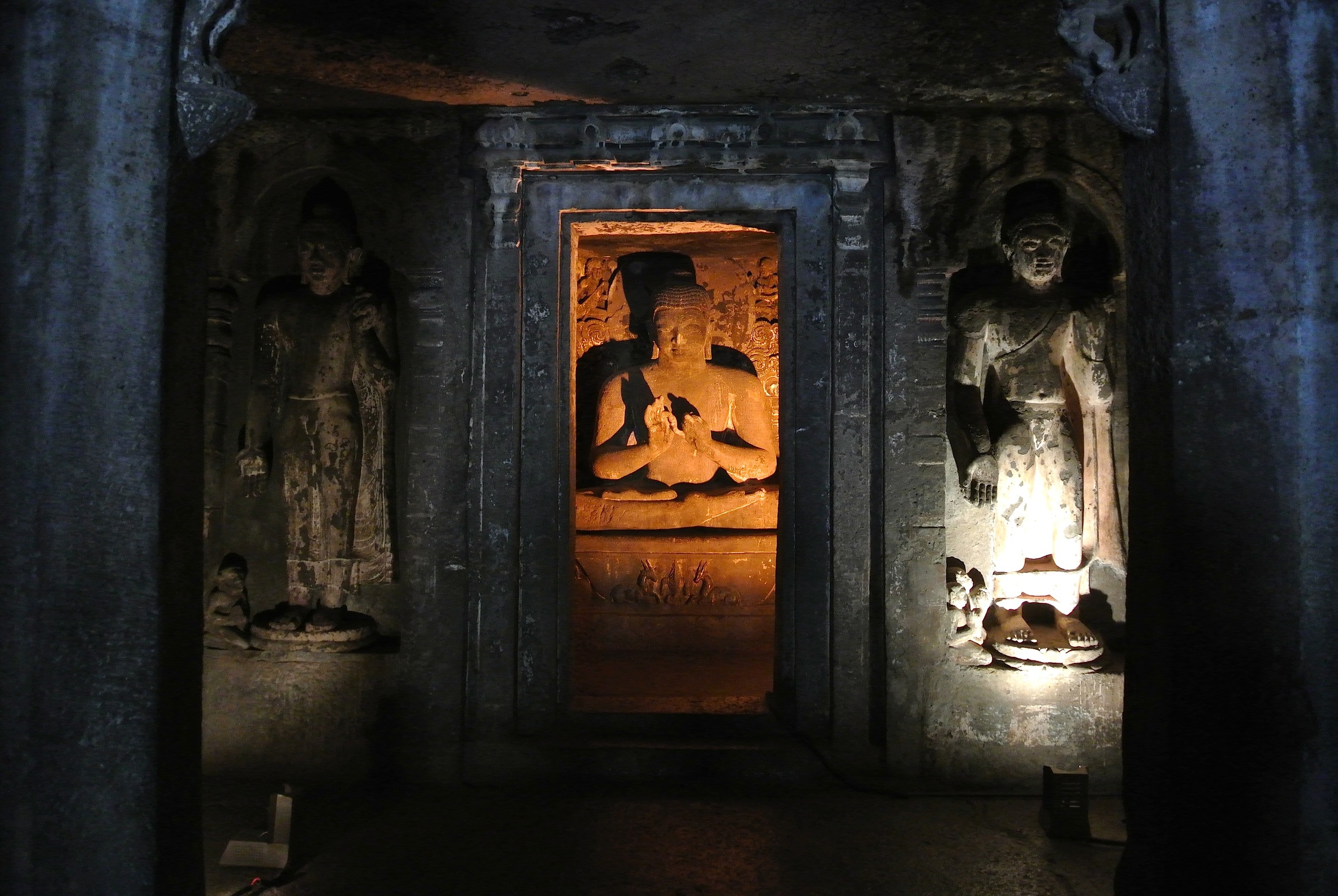  Cave 1:&nbsp;A statue of the Buddha flanked by Avalokitesvara and Vajrapani, the embodiments of compassion and spiritual energy 