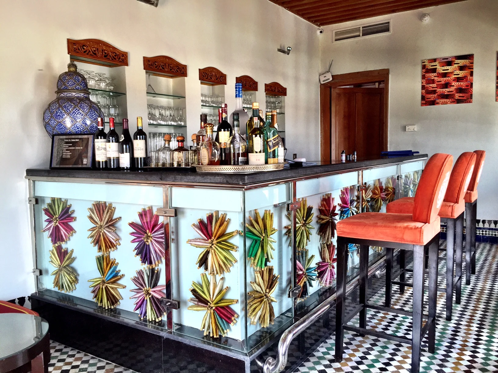 The bar on the rooftop features a design made from bobbins, used in embroidery
