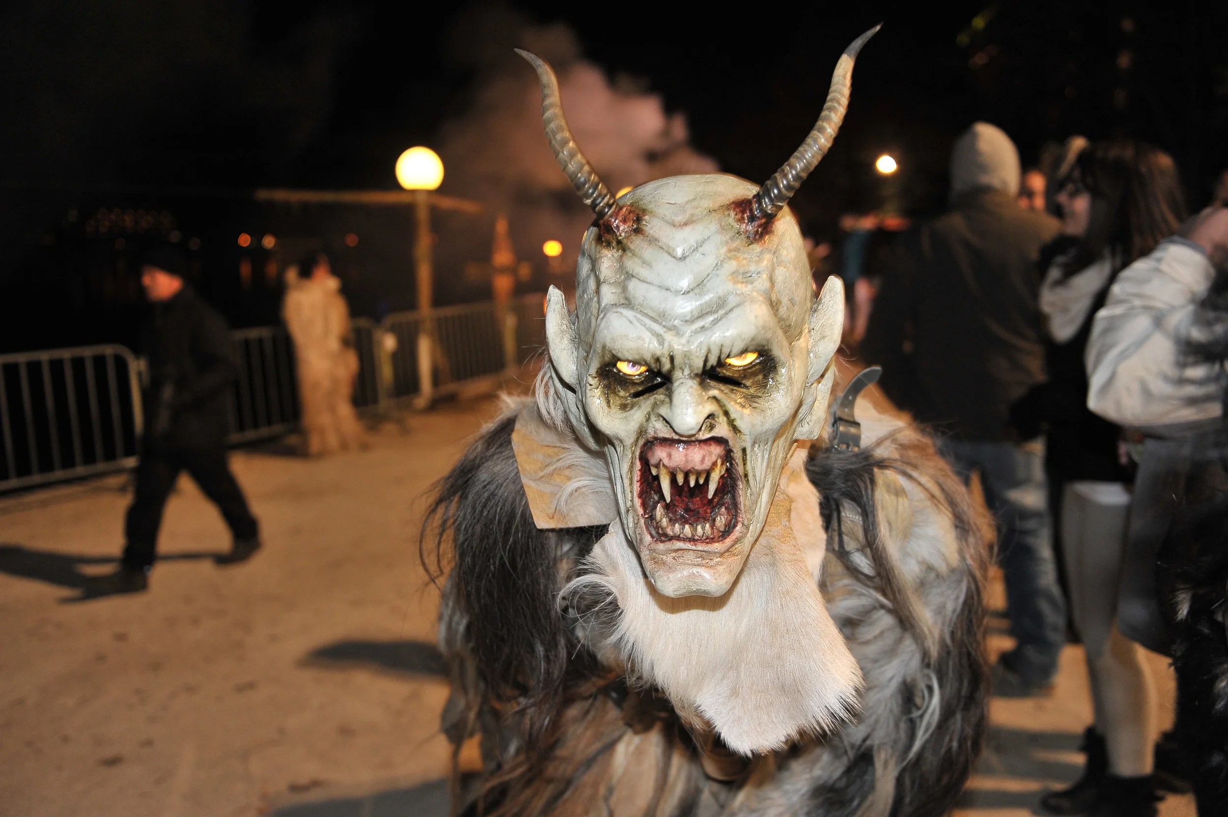 A man dressed in his horrific finery takes part in a Krampuslauf, or Krampus Run