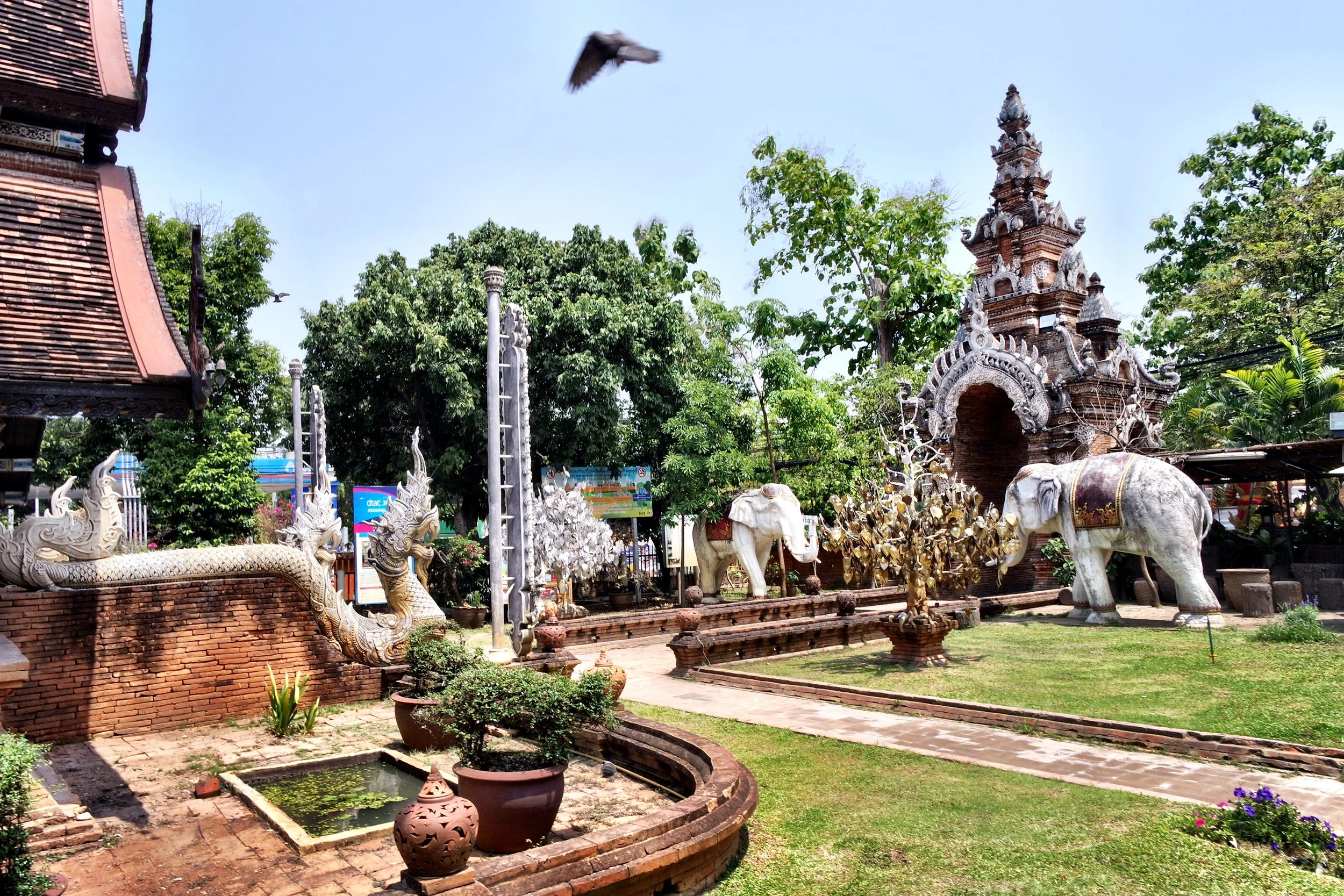 It never makes the list of must-see temples in Chiang Mai, but we both fell under the spell of Wat Lok Molee