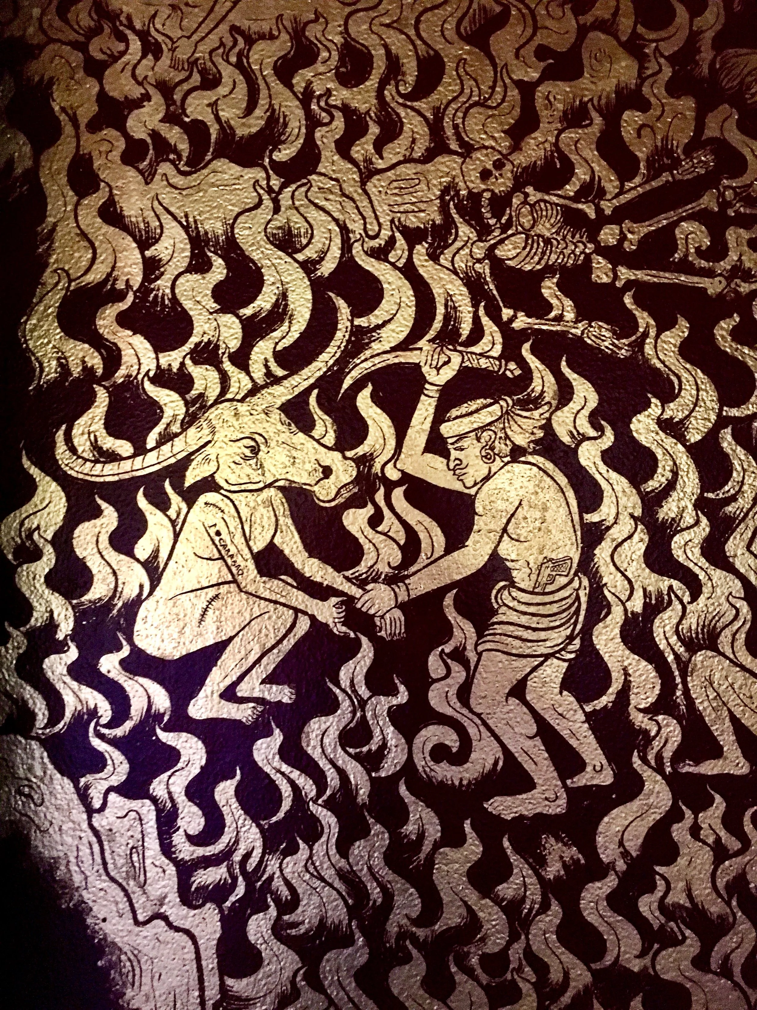 Inside the viharn is a cool metallic mural that depicts the Buddhist version of Purgatory (which sure looks a lot like our Hell)