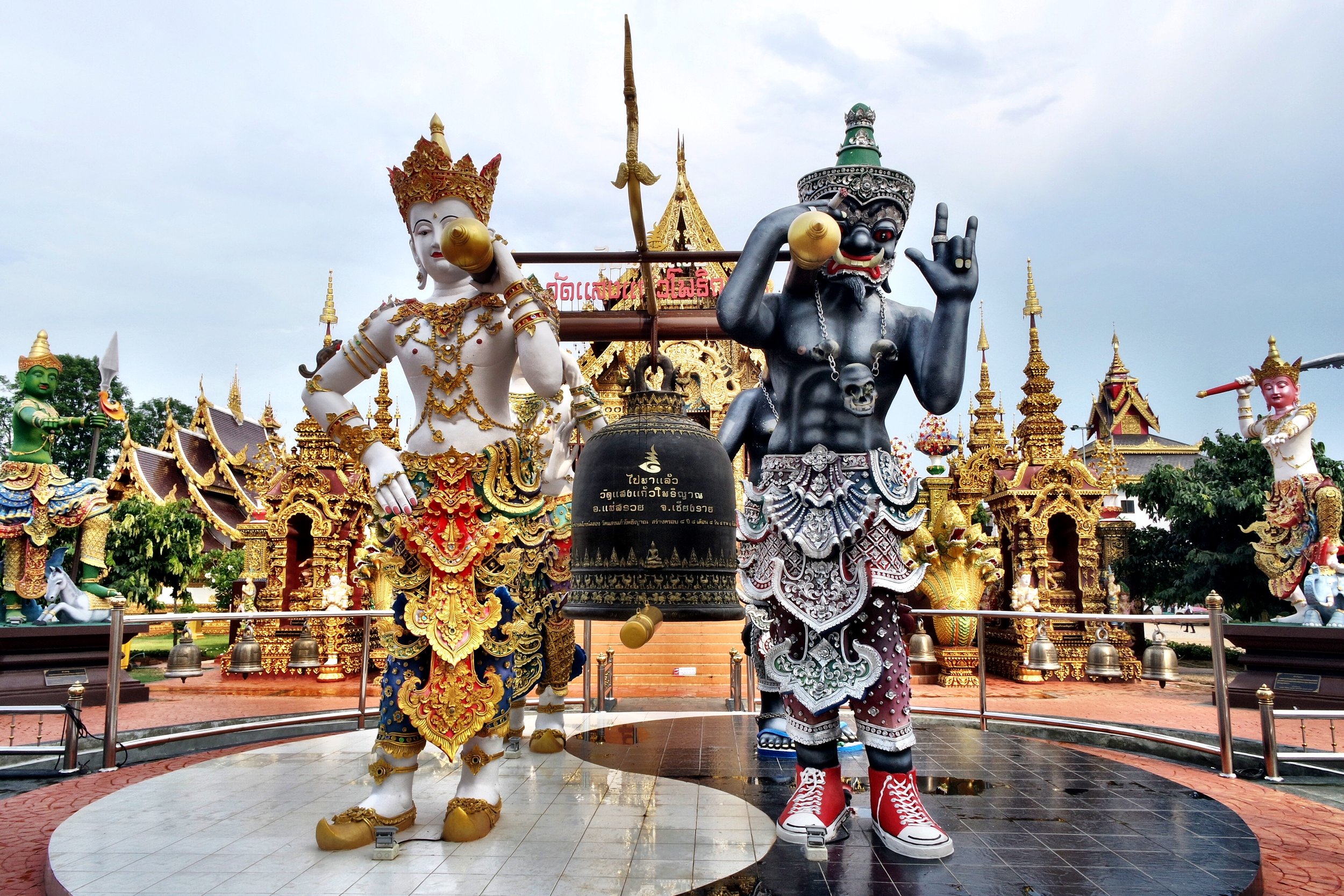 The good guys on the left; bad guys on the right. We loved the modern touches like the red Converses, hand gesture and cell phone in the back pocket