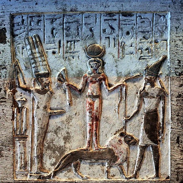 That’s Resheph off to the right, the personification of plague. He’s hanging out with his friends Min (the fertility god with the big boner) and Qetesh (the goddess of fertility and sexual ecstacy)