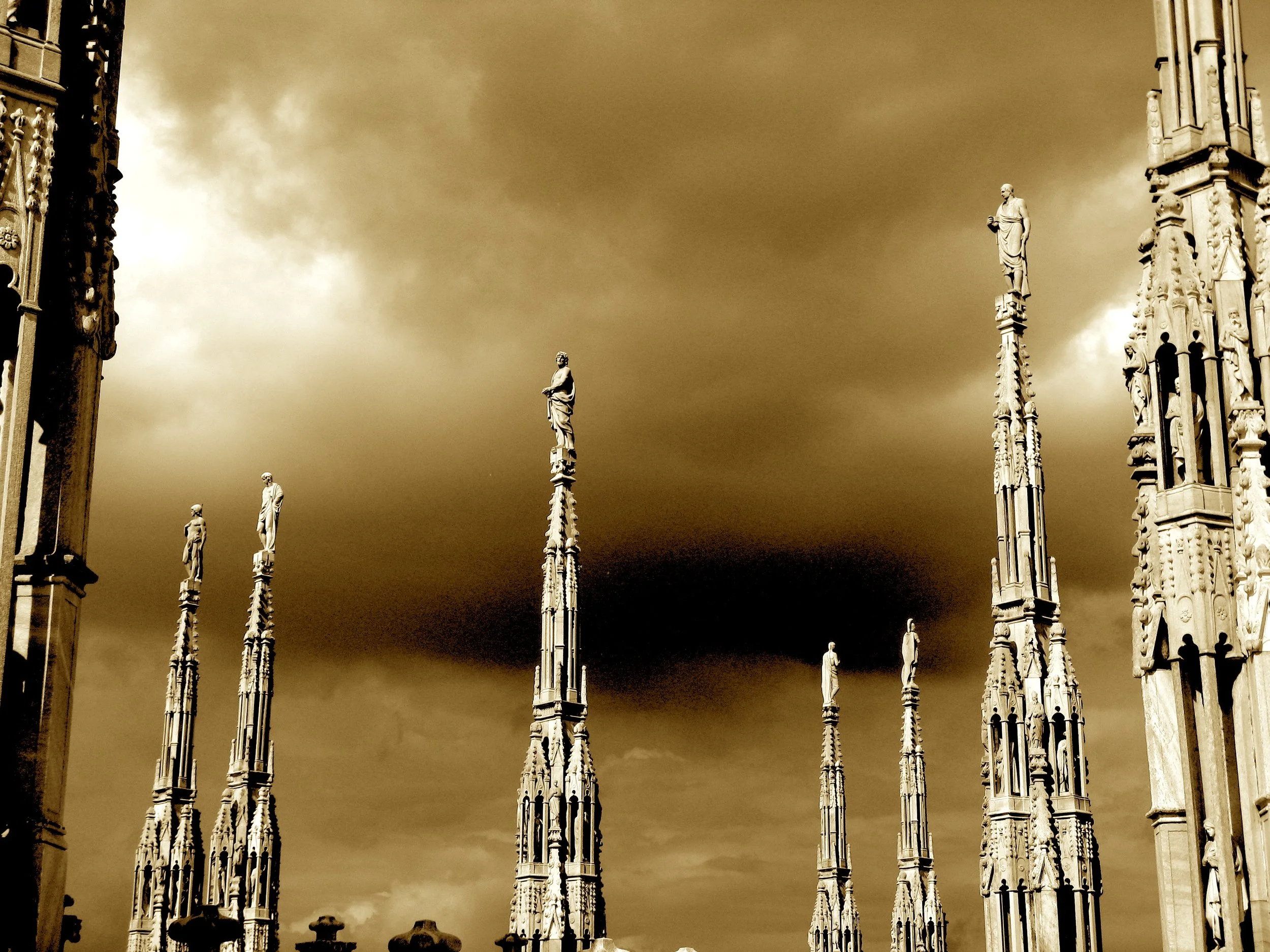 Delicate spires topped with religious figures are part of the elaborately decorated Duomo.