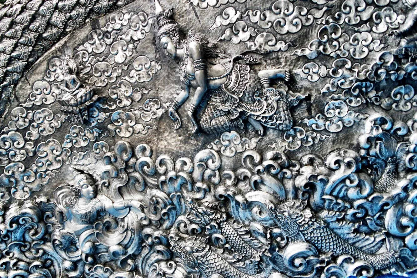 The intricacy of the repoussé silverwork on the temple is truly stunning