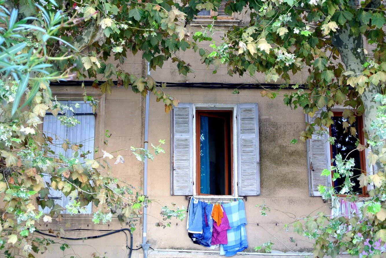 Windows with laundry hanging outside are another common sight in Provence