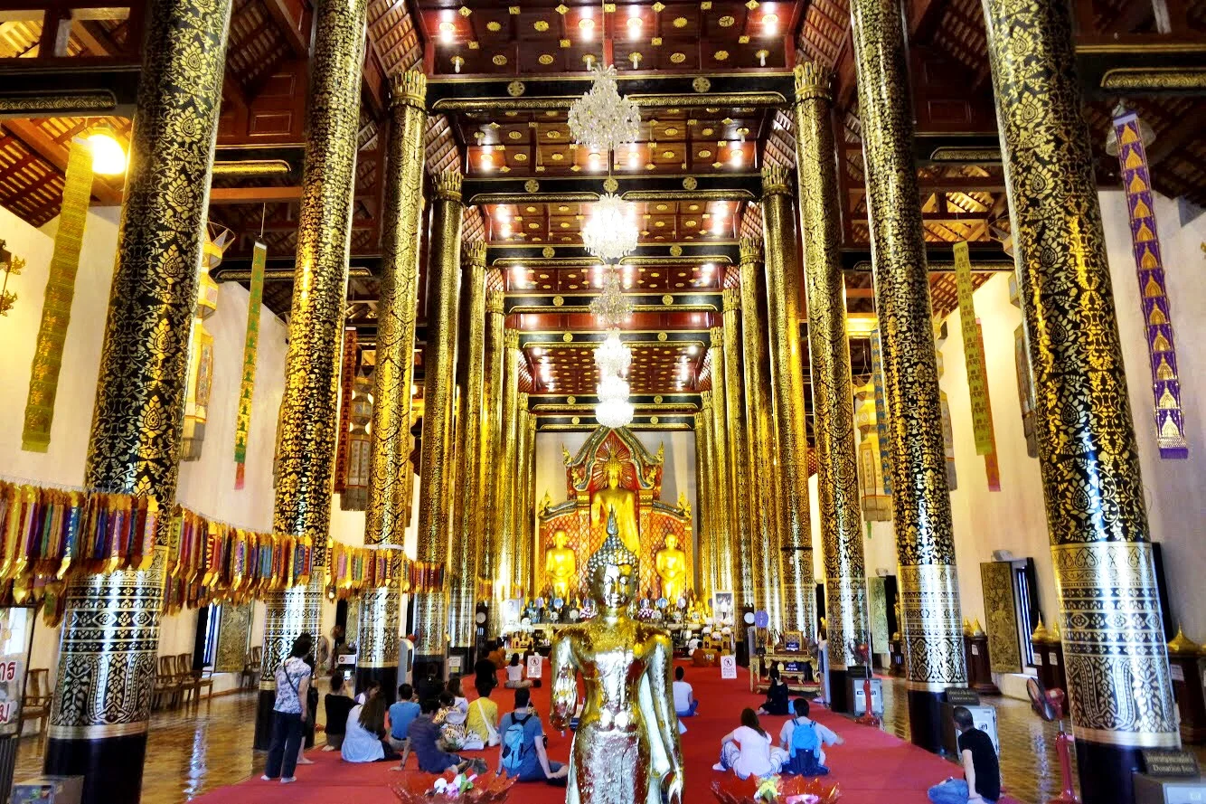 The immense viharn at Chedi Luang is lined with gorgeous gilded pillars