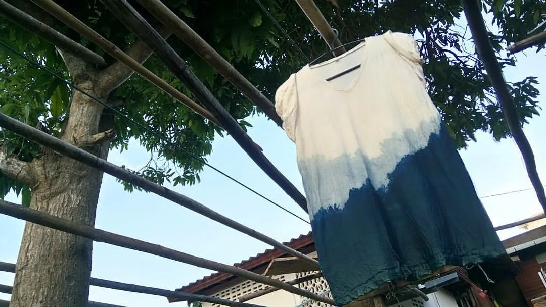 A dip-dyed ombré T-shirt Patty created hangs to dry