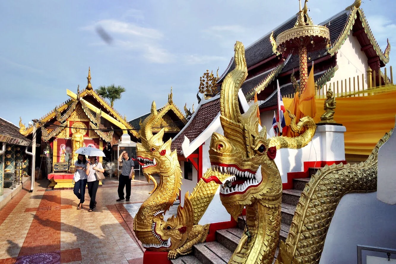 Gold, red and white dominate the temple, which is filled with typical Thai flourishes