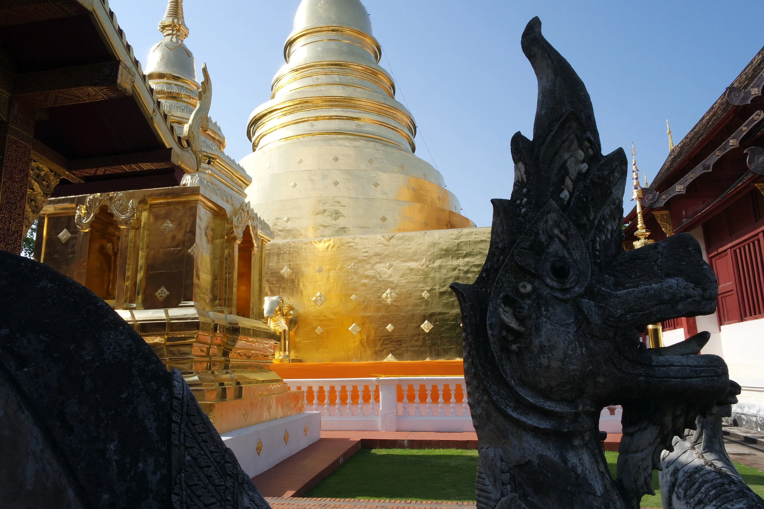 There aren’t any lions on the grounds of Phra Singh that we could see — but you’ll always find plenty of giant snakes called nagas