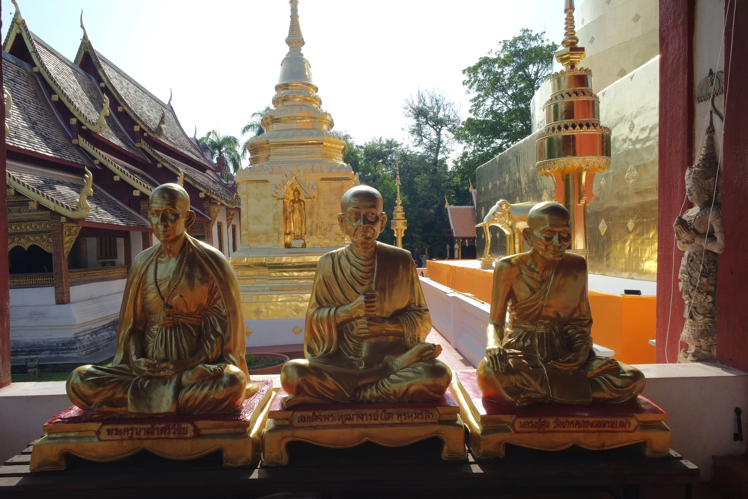 There’s no shortage of glittering gold on many Thai temples — and Wat Phra Singh is no exception