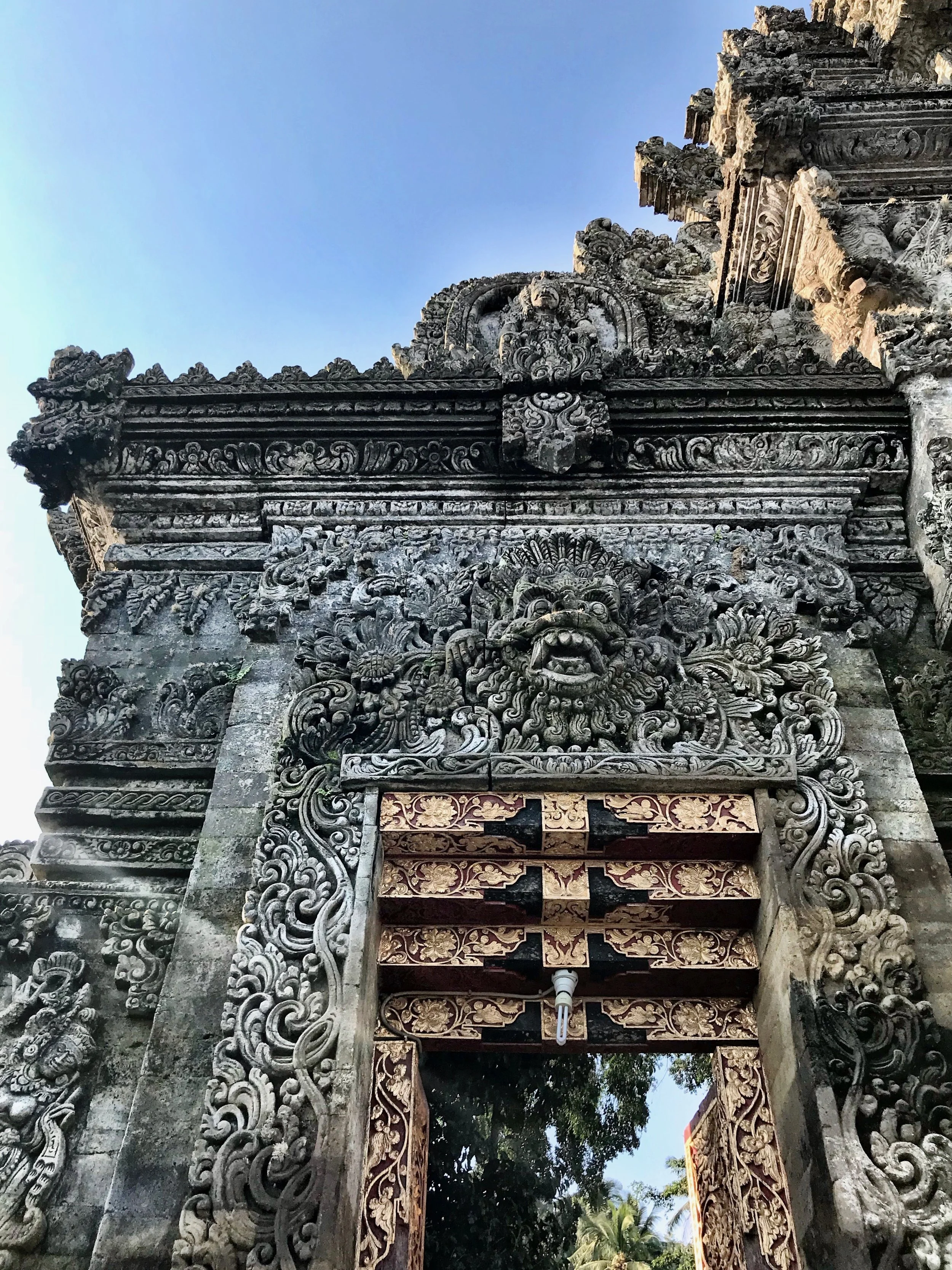Bhoma, with only his head left, guards temple entrances