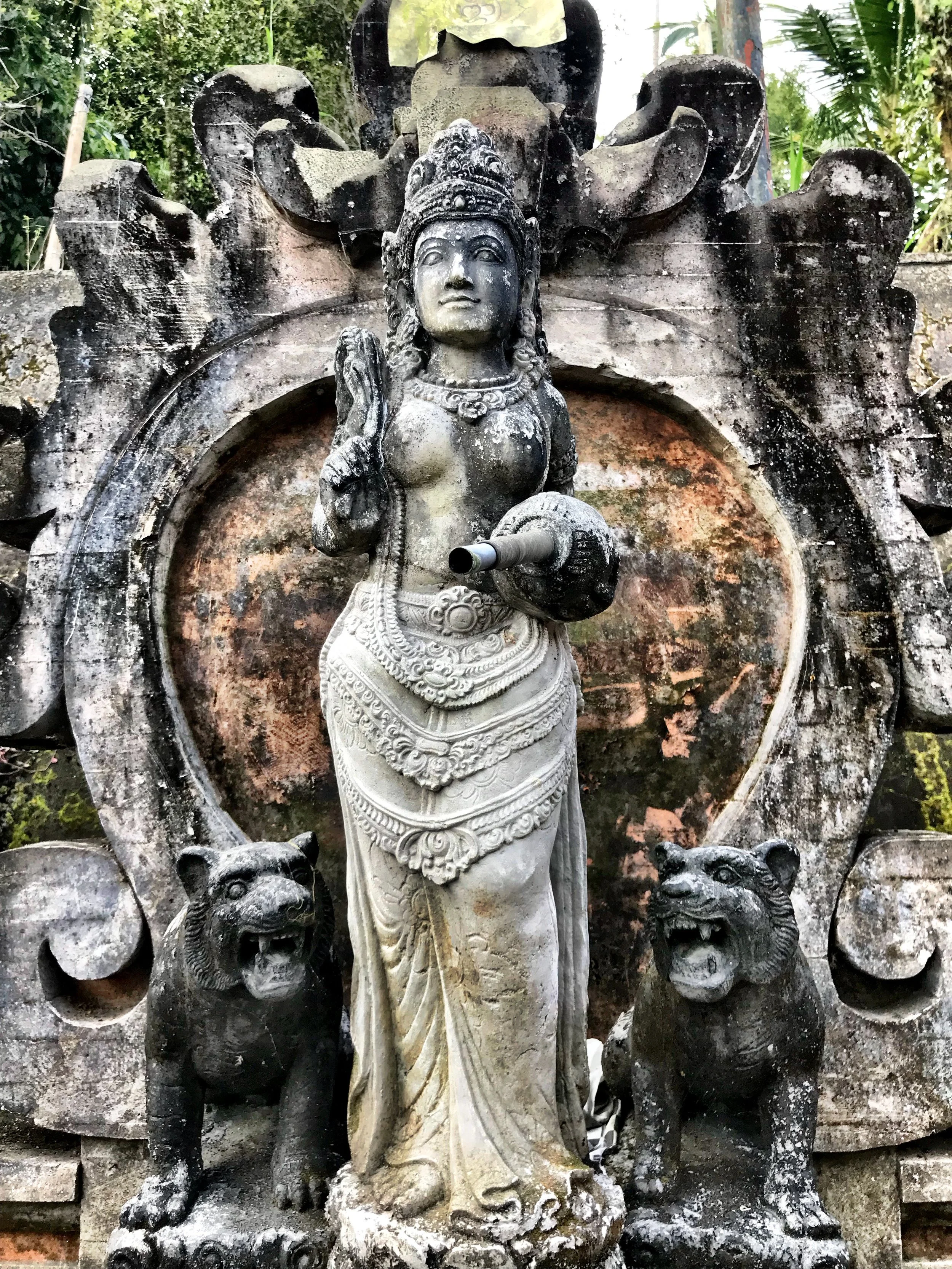 This no-longer-working fountain might bear the icon of Dewi Sri, the Balinese rice goddess