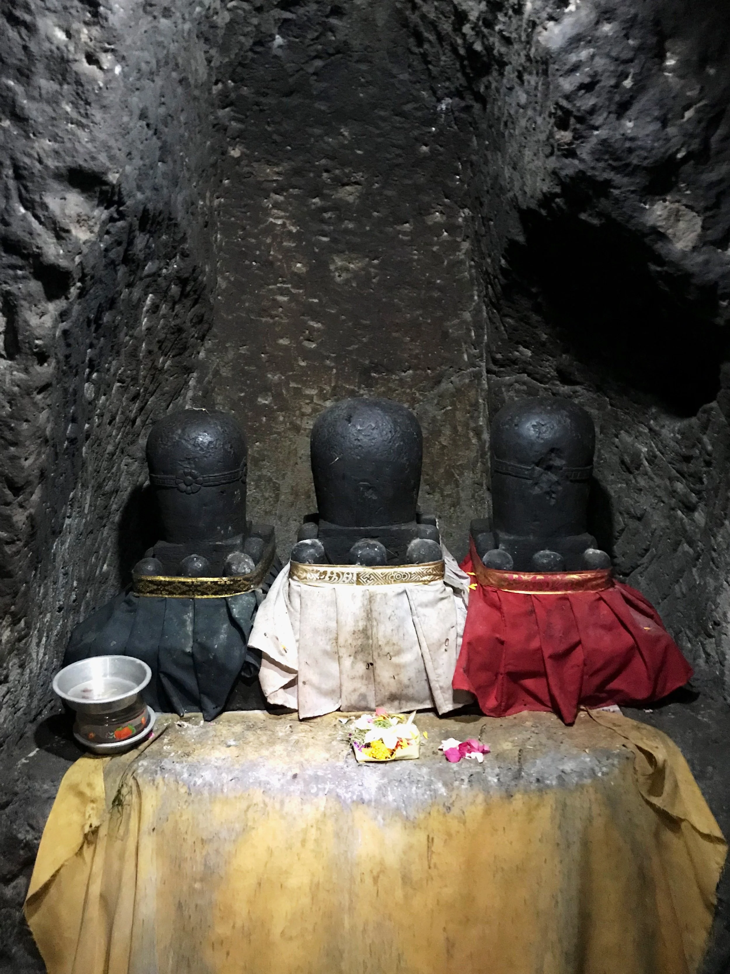 Inside the cave are three phallic linga in honor of the Hindu deity Shiva the Destroyer