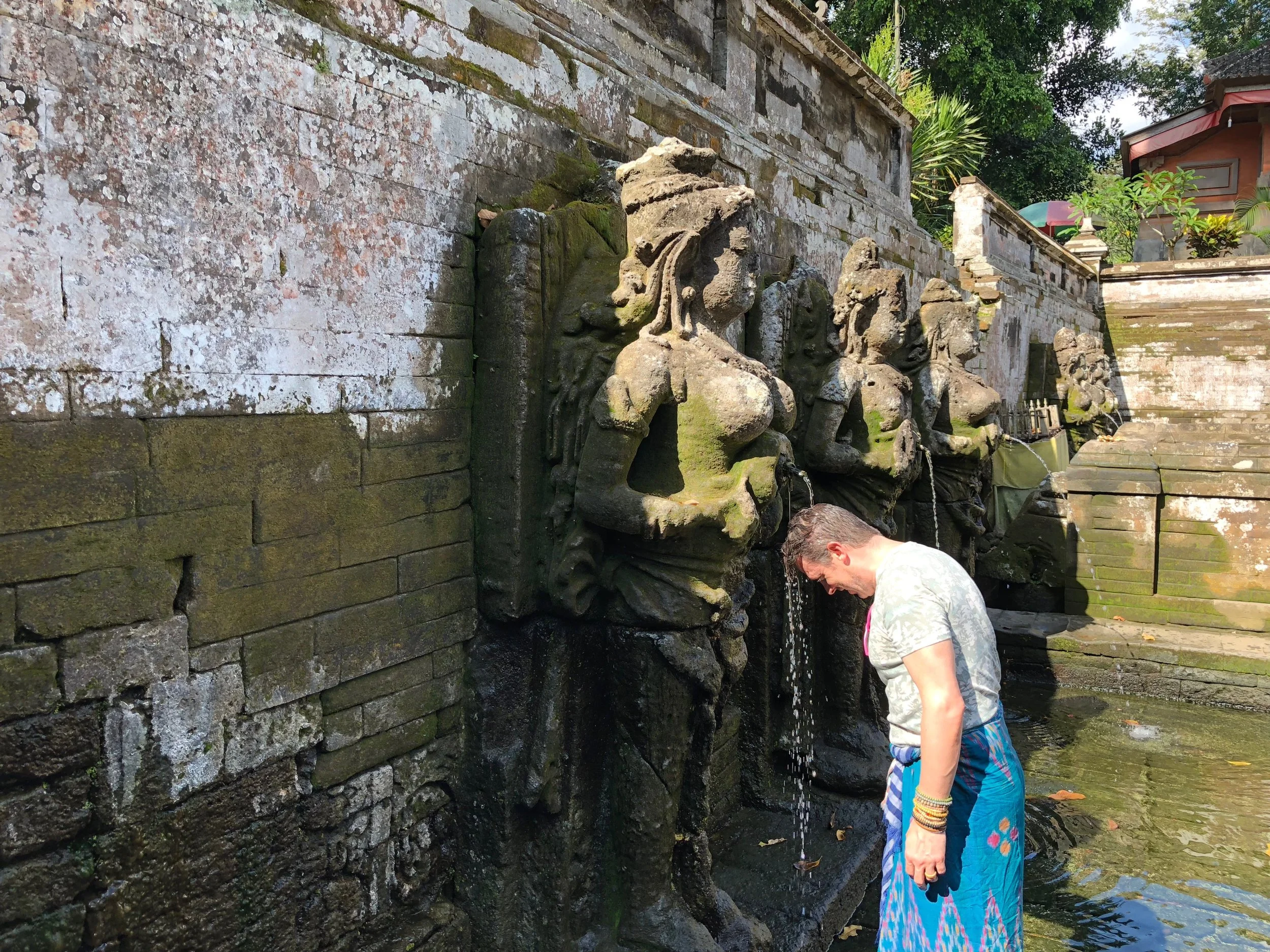 Wally bathes in the holy water