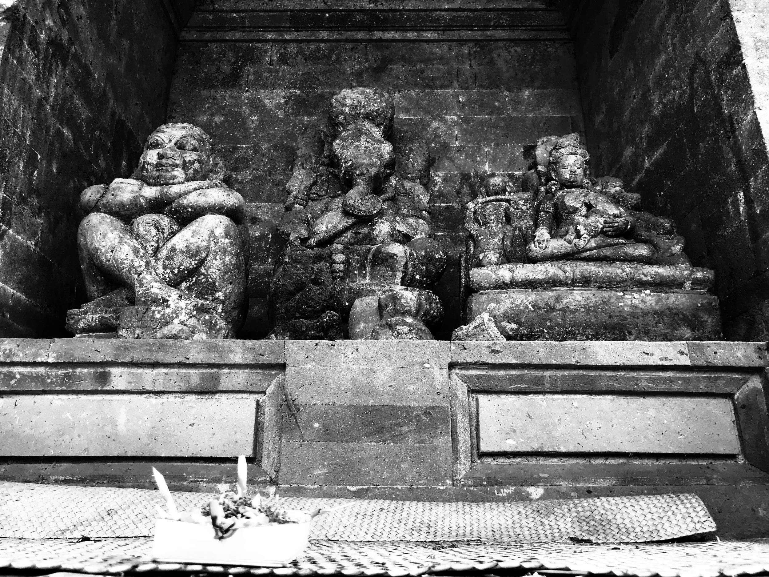 Statues fill a niche. Compared to other holy sites on Bali, Goa Gajah is quite small