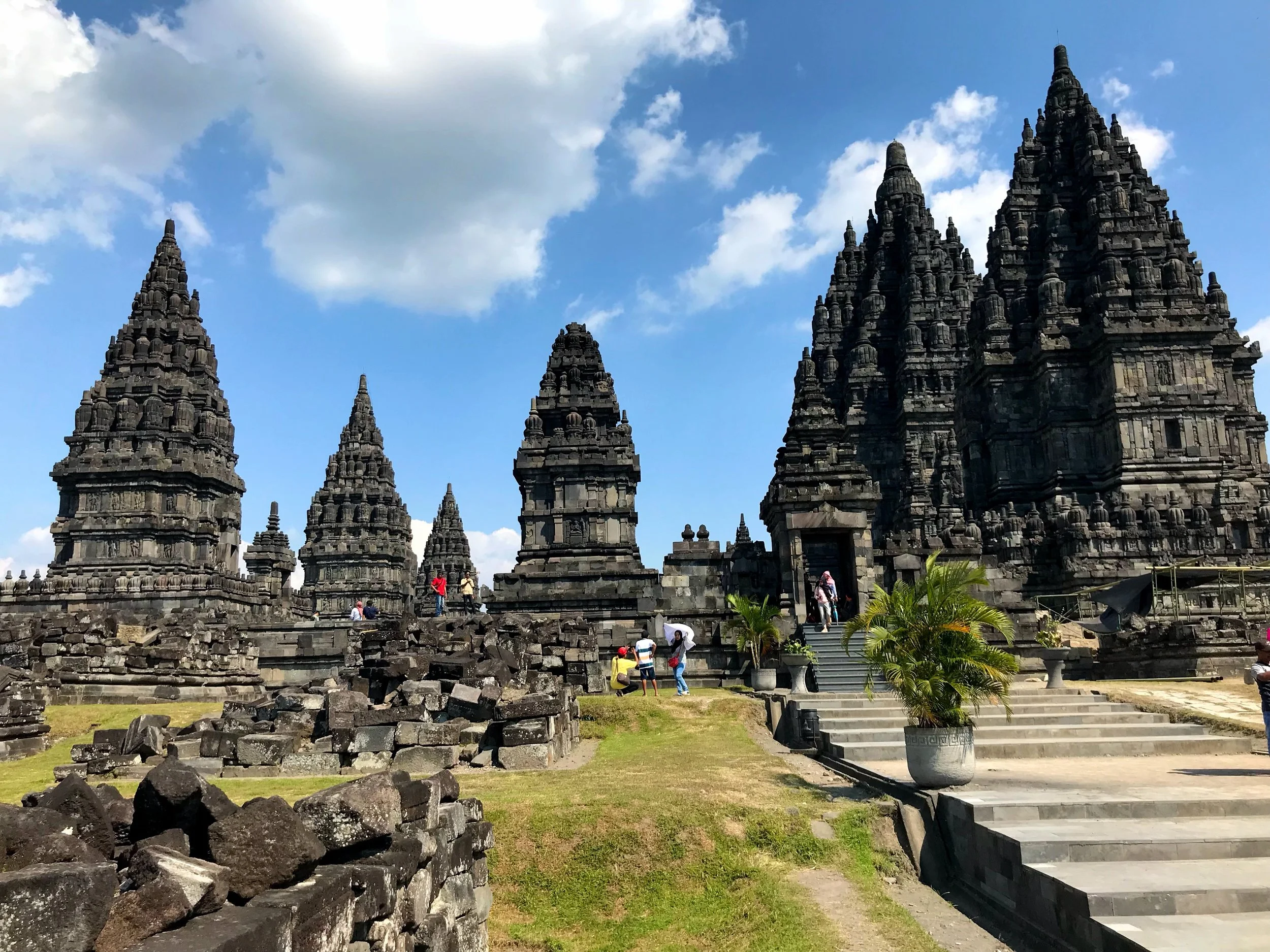 The ornate black stone temples create an imposing silhouette