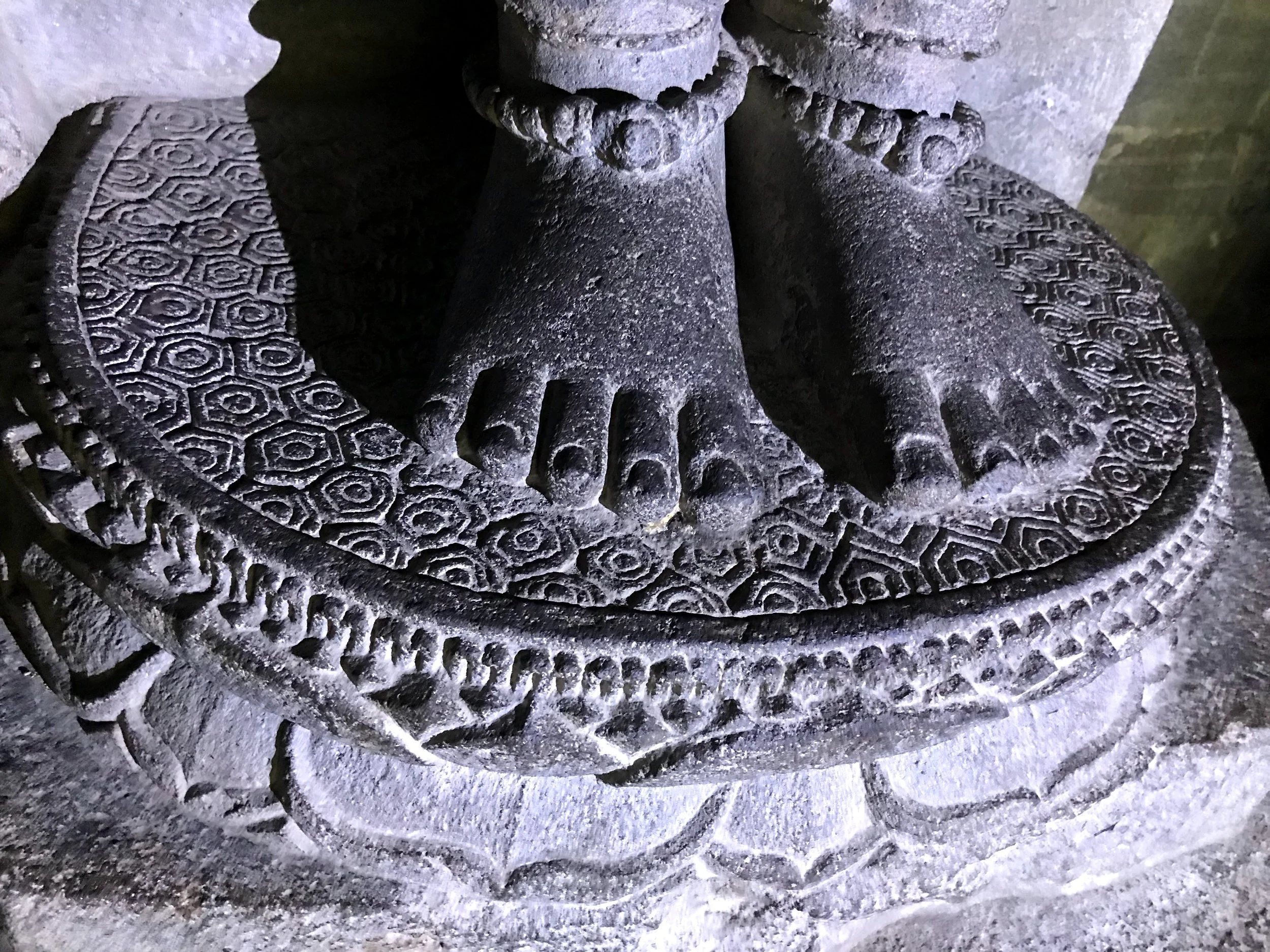 Shiva stands upon a lotus, which symbolizes enlightenment — an odd depiction of the god