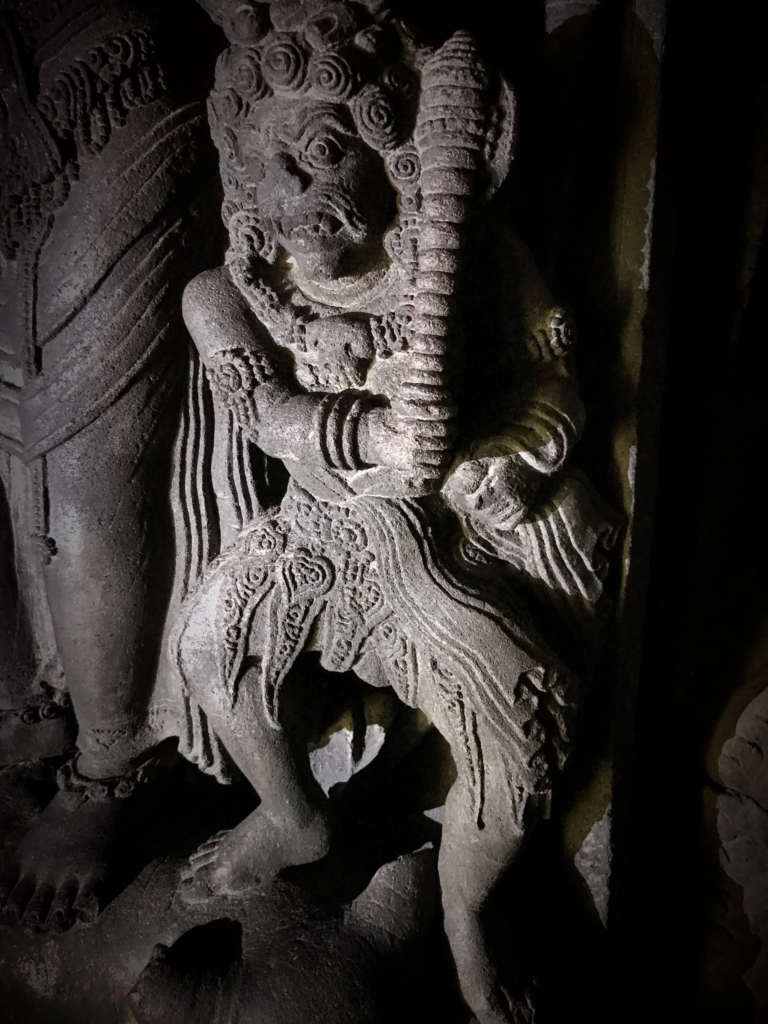 This dwarf isn’t happy that Durga is touching his head