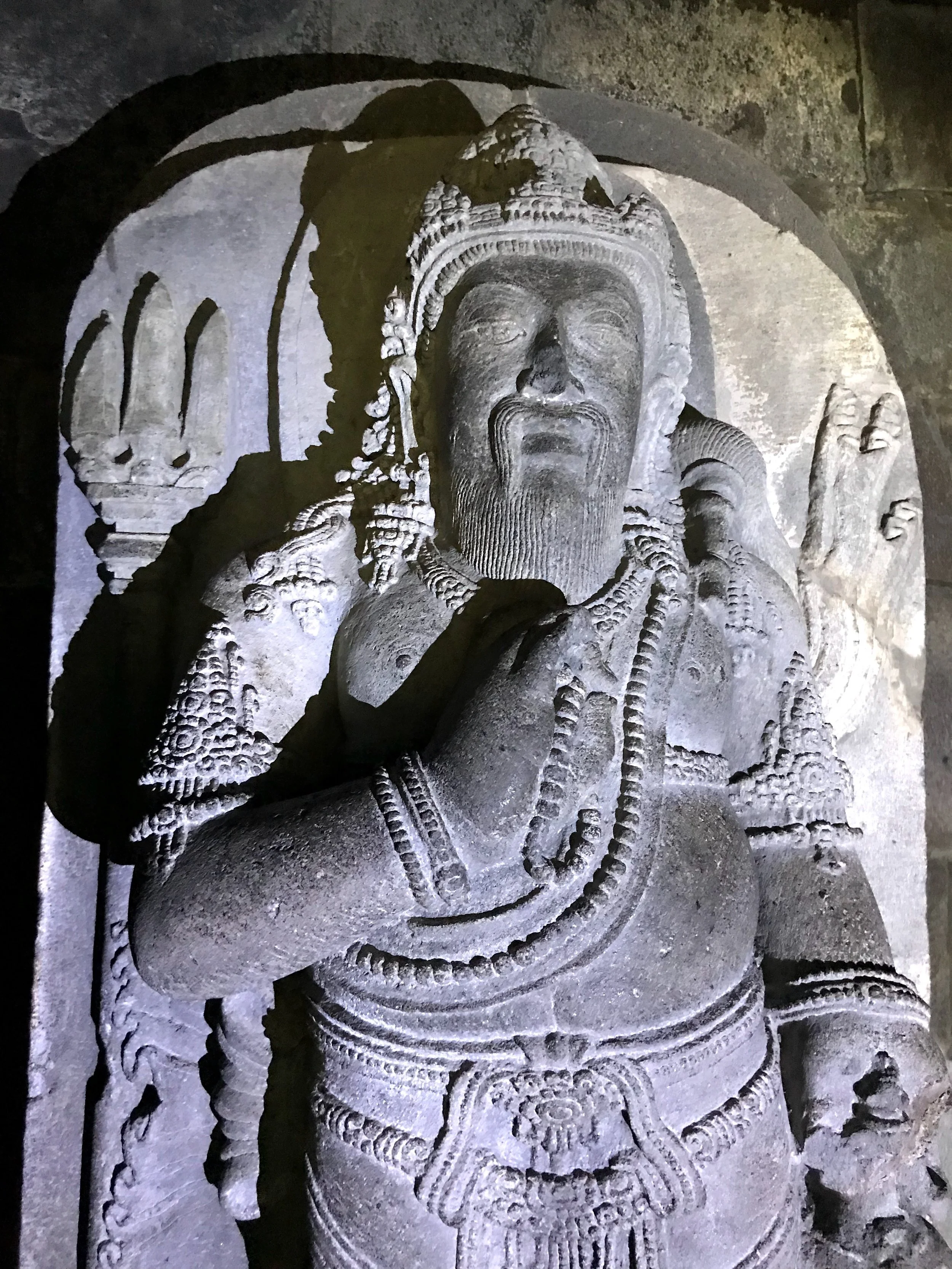A statue of the dwarf hermit Agastya with his trident