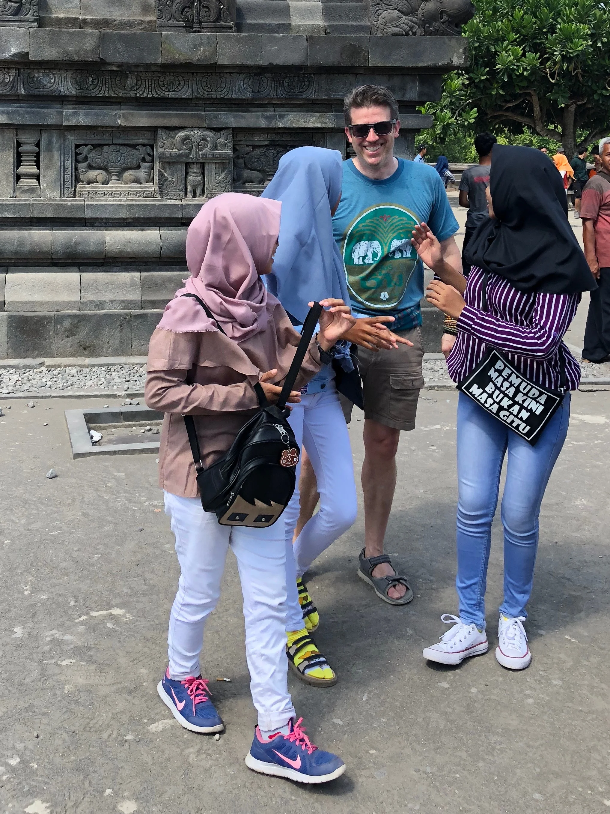 The girls wore jeans, sneakers and brightly colored headscarves. “You’re so tall!” they exclaimed